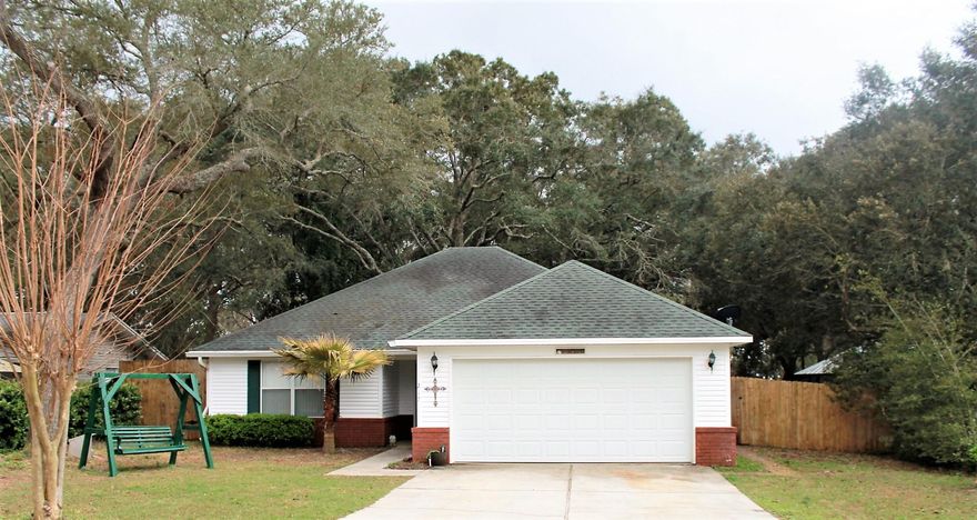 Move-In Ready 2 Bedroom/2 Bath home located in Choctaw Beach for under 200K!! This home is complemented with a Large Living/Family Room area, Tile and Carpeted Floors, Nice Kitchen with Breakfast Bar and Breakfast Nook and Tons of Storage, Ceiling Fans throughout, 6 Panel Interior Doors, Custom Light Fixtures, External Generator Connection, and private yard with large custom deck surrounded by mature trees with privacy fence. The Master Bedroom has patio doors opening to the large deck, Custom Master Bath with Dual Vanities and Large walk in closet. Seller is offering a $2000 Flooring Allowance.