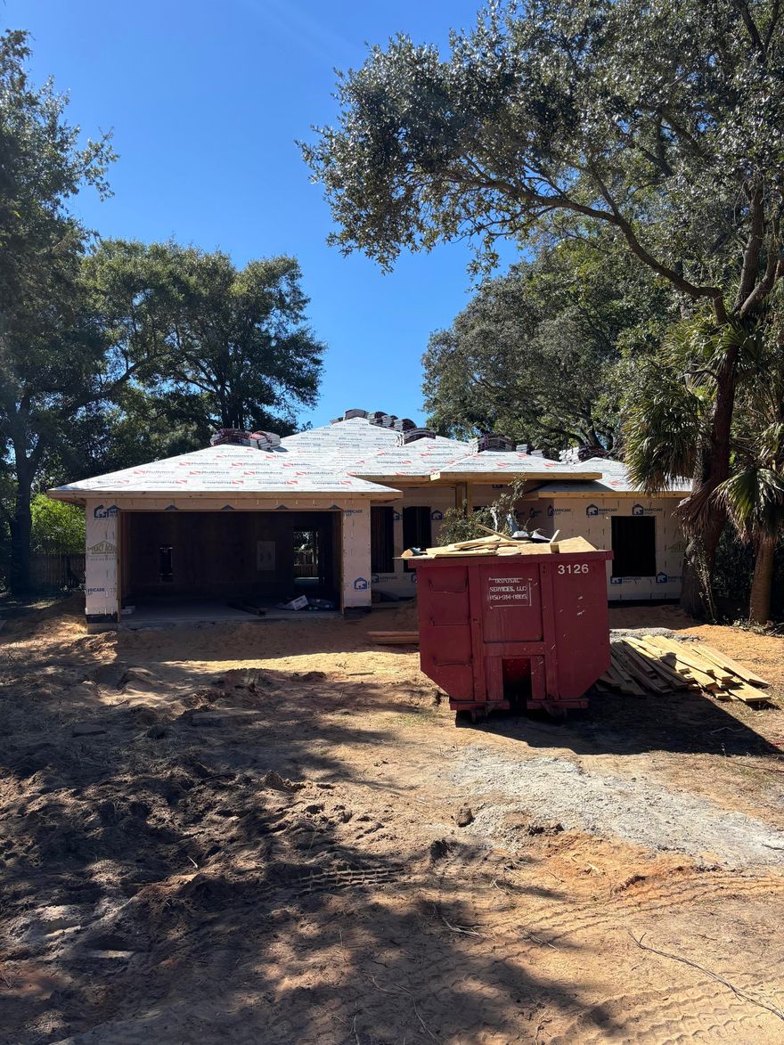 Step inside this beautifully designed 4-bedroom, 3-bath home where luxury and functionality meet in every detail. Soaring 11-foot tray ceilings in the living room and 10-foot ceilings throughout the common areas create an open, airy feel, while the primary suite's 10-foot tray ceiling adds a touch of elegance and tranquility.The chef's kitchen is a showstopper--featuring soft-close cabinets and drawers, an oversized industrial-style refrigerator/freezer, and a wet bar with a built-in beverage cooler, perfect for entertaining.Relax in the spa-like primary bathroom, complete with a 6-foot soaking tub and a 3x5 floor-to-ceiling tiled shower. Each of the two guest bathrooms includes oversized 42'' x 5' tub/shower combos, offering both comfort and style for family or guests. Outside, enjoy a large covered back porch, ideal for morning coffee or evening gatherings. The RV/boat pad includes a 50-amp electrical hookup and sits behind a 10-foot gated entry, with ample room to add a pool pending city approval.

Every feature of this home was thoughtfully chosen to blend craftsmanship, convenience, and modern designready to welcome you home.