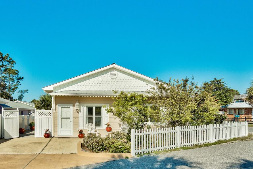 Looking for the 30A lifestyle but unwilling to pay the 30A price? This is ONE OF THE BEST DEALS IN 30A! Look no further than this Florida Cottage gem located in the heart of Blue Mountain Beach in the desirable Blue Gulf Resort, just over a half a mile to the beach & emerald green waters of the Gulf of Mexico! This is the only 4BR home available in the ''Brickyard'' and has a higher elevation than most homes in this community at the top of the hill - flood insurance is not required. This property is ideally a one-level brick & hardiboard home and a corner lot just one row back from 30A. You can access the property from Bluefish or Flounder. The home was recently updated with brand new contemporary tile in the living area & master bedroom and stunning granite in the kitchen (March 2017). French doors in the living area open up to a paved patio which is very spacious and could also be used for entertaining, outdoor dining or even additional parking - great for golf cart or boat. There are three cement patios for easy maintenance and no hassle beach living! Enjoy the private outdoor areas  amongst tropical palms, or rinse off the sand and salt before entering in the outdoor shower(s). The storage shed provides a great place to store beach gear. 

Interior offers an open floor plan with great natural light. The new contemporary tile is features in the spacious living area and master bedroom then the square tile is featured in the dining area & kitchen with a decorative mosaic trim to the hallway to tie it together. The kitchen is spacious with ample cabinets, brand new granite countertops and a convenient access to one of the side patios. The formal dining area features crown molding, borders the living area and is open to the kitchen. There is nice natural light throughout the home giving it a beachy airy feel. The master bedroom in the front is a great size and offers an en-suite bathroom. There are three guest bedrooms, one with an en-suite half bath and the others with a shared guest bathroom. Two of the guest bedrooms feature tile floors and the other has carpet and could be a great office or play room. 

This property is an ideal location with two beach accesses nearby within a few blocks. The nearest public access is at the south end of Highway 83 with parking and restrooms but there is also an additional Blue Lupine access across the street behind Redfish Circle bordering The Inn at Blue Mountain Beach. You are also only one road back from 30A so very close to the action and bike path, but still have privacy on a corner lot. Blue Gulf Resort also has access to The Village at Blue Mountain Beach amenities for an additional annual charge with the Village HOA. For the additional fee enjoy the pool area, sun deck, shuffle board and fitness center. 

Blue Mountain Beach is the highest elevation of Florida's Gulf Coast lending incredible views and beautiful natural dunes and wild flowers. Enjoy the great outdoors with the surrounding state parks, nature trials and the 22-mile bike & jogging path. Kayak or paddle board on one of the rare coastal dune lakes and experience a unique ecosystem that is only available to approximately 11 locations in the world! There are many options nearby for dining and entertainment and you are close to the picturesque towns of Seaside, WaterColor and Rosemary Beach. Do not miss out on this incredible opportunity to own a 4-bedroom home in a prime location close the beach!