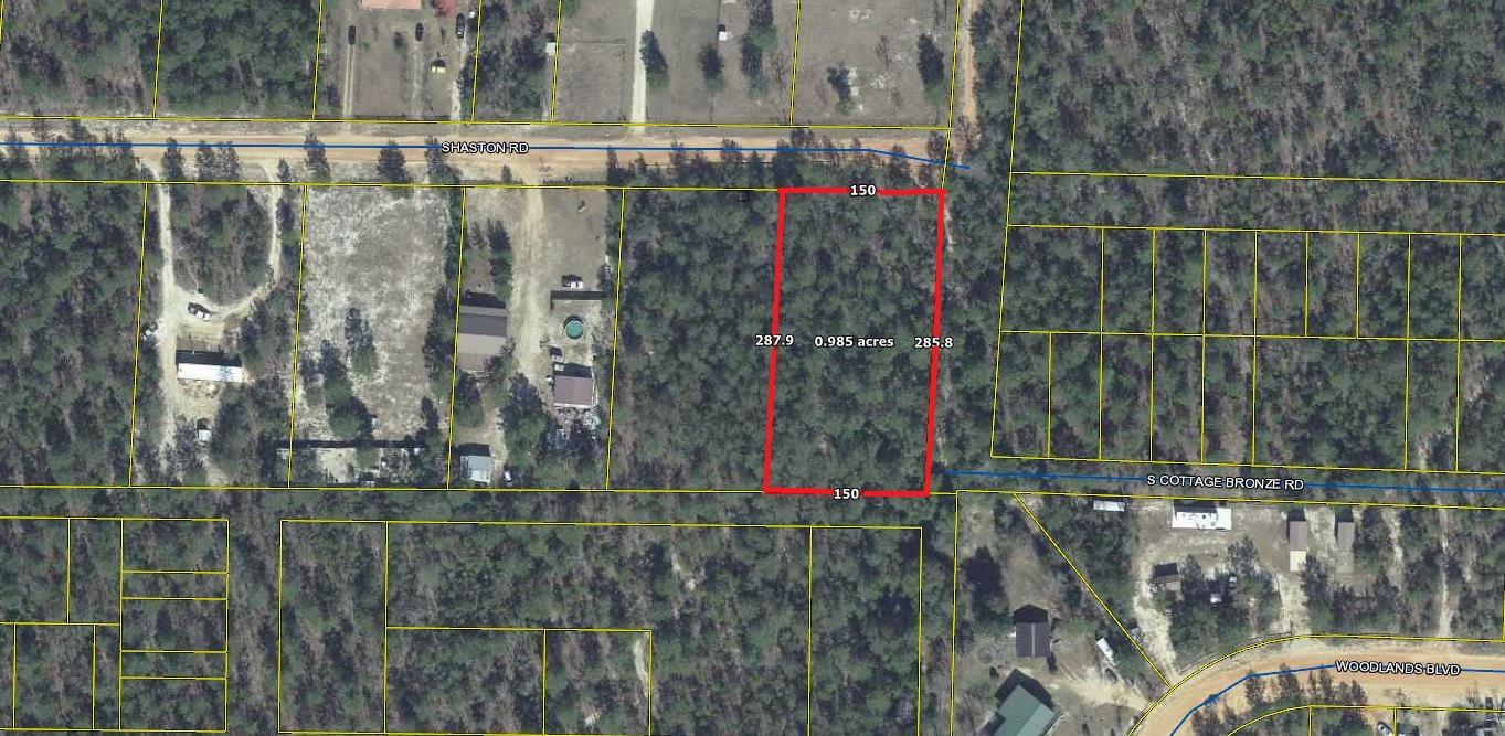 Apx. 1 ac lot on Shaston Rd. Great location in growing Mossy Head. Mobile/manufactured homes allowed. Well & septic will be required. Power is available on street.