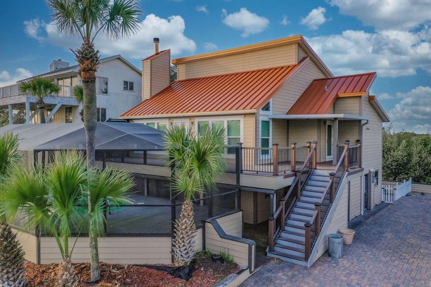Perched atop one of the highest points of elevation in Destin, this four-bed, three-bath home on Wildcat Ridge offers gulf breezes and views of Destin Harbor. This 2,700-sq.-ft. home has unlimited potential in a unique package with both peek-a-boo gulf view from the front desk and views of Choctawhatchee Bay from the top story. The primary living areas in this home appear on the second and third floors with three bedrooms, two baths, cathedral ceilings and a stone fireplace. The ground level has its own one-bedroom apartment with kitchen and laundry, making this purchase an ideal investment that could allow two separate rentals. Enjoy plenty of storage in the form of two large storage rooms downstairs and a storage shed in the backyard. If you're looking for a unique opportunity in the heart of Destin with no HOA and plenty of parking, you've found it.