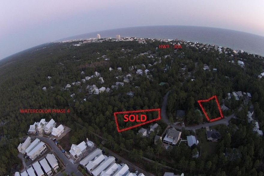 A quiet quarter acre wooded lot in the heart of Seagrove Beach. Just off 30A, close to Seaside, Watercolor, Publix and restaurants. Sits almost at the end of the Cul de sac. This private lot backs up to a wetland creek area where no one can build behind you. A public beach access sits at the end of the street. Sugarwood is an established community of vacation homes as well as full time residents. Long and short term rentals are permitted. Under ground utilities & Flood zone X