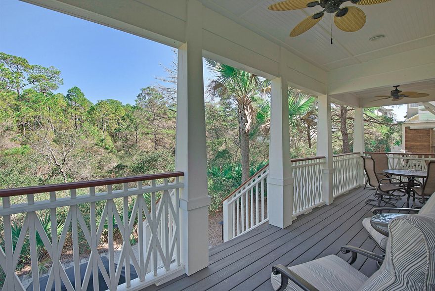 Darling open floor plan with main floor master bedroom and 1/2 bath. Enjoy the porch views on the main and second floors. Overlooks the wooded preserve behind. Each bedroom has it's own private bath.Making it a perfect rental or family year round residence. Easy double entry floor plan. Kept in immaculate condition. The porches make this a private retreat or great rental opportunity.