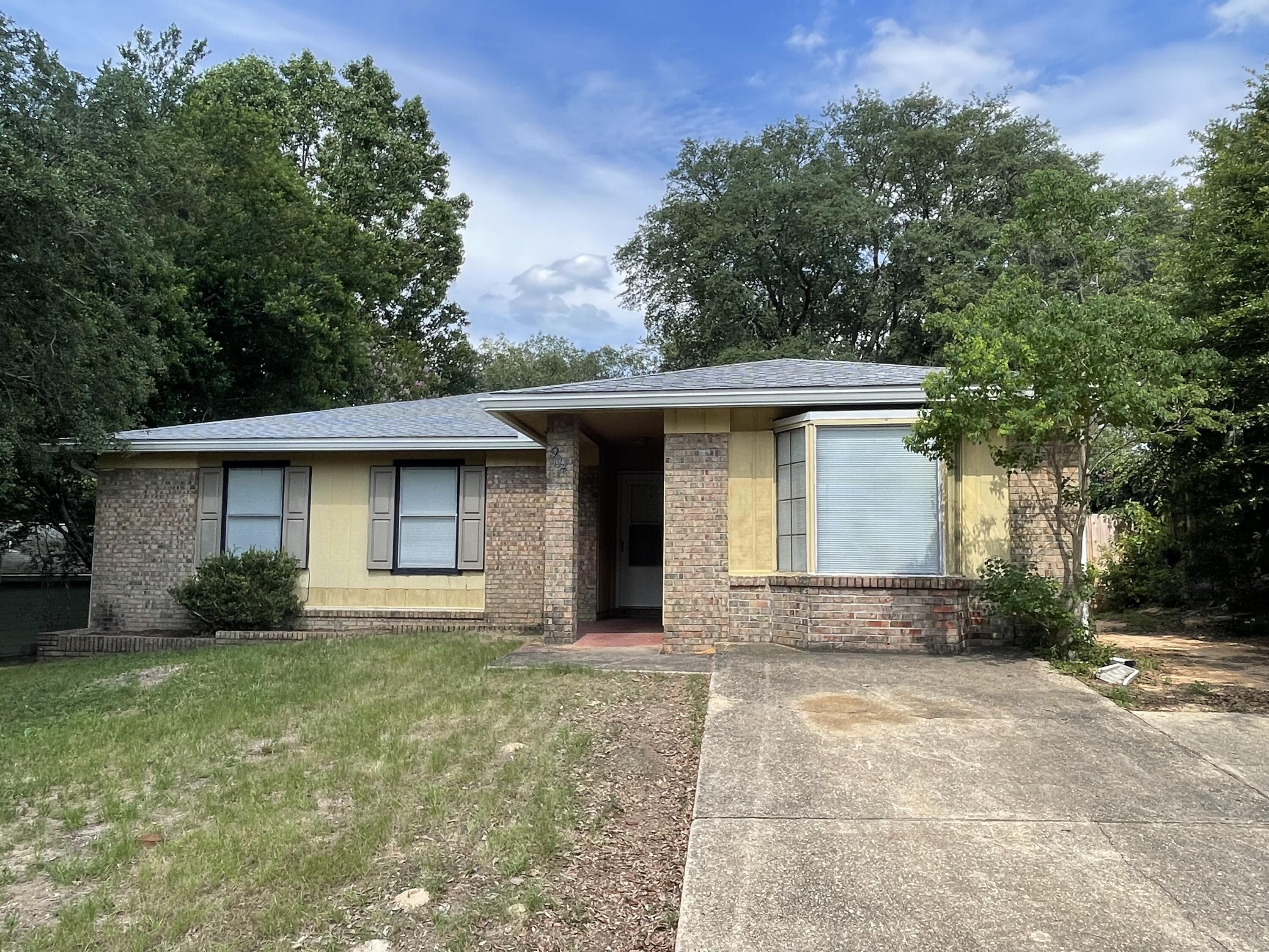 This 3 bedroom 2 bath (with converted garage) home is waiting for you. Close to the high school. Newly painted and new flooring adds to the charm of this ranch style home. As you enter the home you will notice a very large living area with plenty of room for oversized furniture. Kitchen has plenty of cabinets, a pantry for storage, and a pass through window for you convenience. You will find a handy breakfast nook attached to the kitchen. Screened in back porch for entertaining your family or friends.