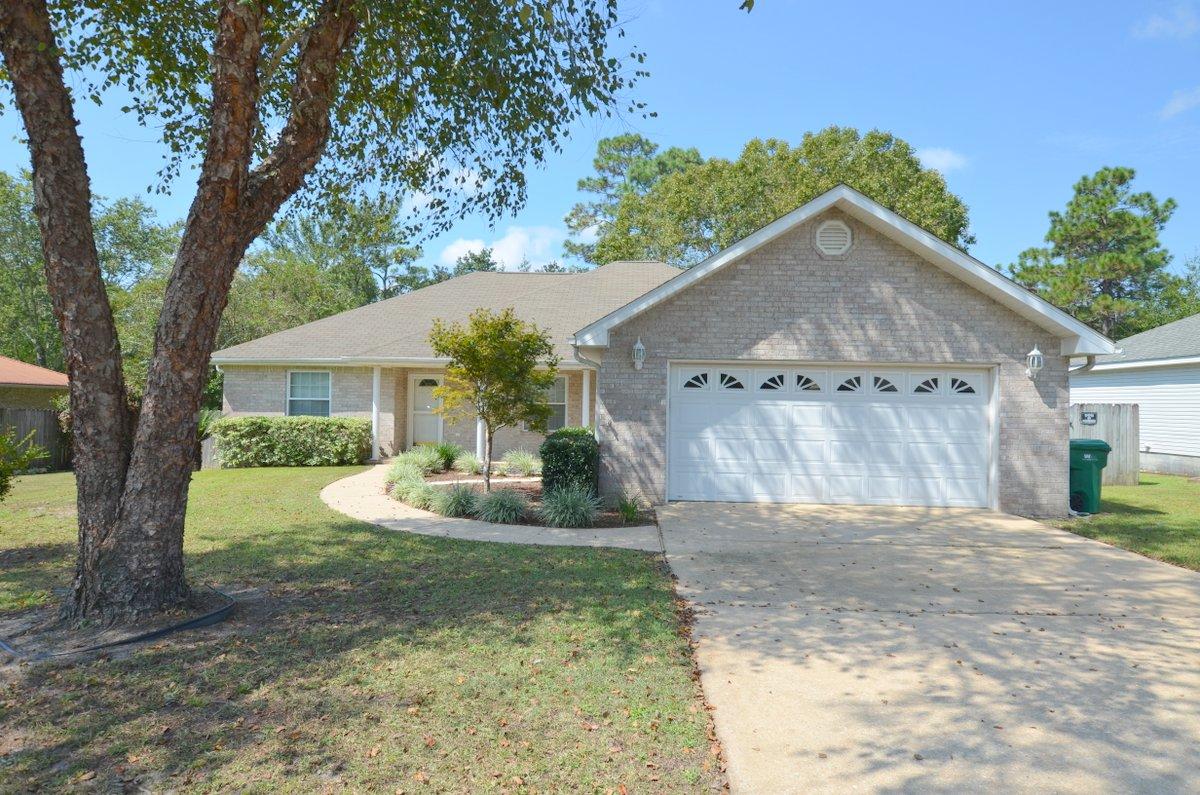 Stop - and check this one out! South Crestview, therefore convenient to interstate, Duke Field and of course Eglin. Bypass most of the Crestview traffic just by this homes location. Built on one of the larger lots in the neighborhood (just under 1/2 acre) this all brick home has privacy fenced back yard large deck off back and 2 car garage. A split bedroom design, the living room is large and inviting. Home has separate dining area as well as a breakfast nook. Home has tile, laminate and wall to wall carpet. No HOA's here and since home was built in 1999 insurance will be lower than other older smaller homes. A must see to appreciate! Call today!