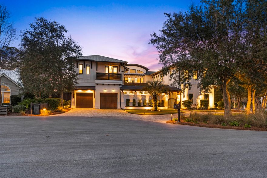 Step into your own private sanctuary--an exquisite modern estate nestled in the highly coveted Old Seagrove community. This architectural masterpiece seamlessly blends sleek contemporary design with the timeless warmth of coastal living.As you walk inside, you will be welcomed by soaring 30-foot ceilings and a dramatic iron floating staircase, setting the tone for the elegant interiors of this coastal masterpiece. The expansive open-concept living space features porcelain tile flooring throughout the entire first level--all with heated flooring for added comfort. The chef's kitchen is a dream, featuring dual Sub-Zero refrigerators, dual Wolf ovens, dual dishwashers, an oversized butler's pantry, and a striking 16-foot quartz waterfall island. Hurricane impact-grade sliding glass doors lead from the kitchen to the serene courtyard, seamlessly blending indoor and outdoor living.

Entertain with ease in the spacious living area, complete with a stylish wet bar and a built-in Sonos surround sound system. The private primary suite on the main floor overlooks the tranquil courtyard and pool, with motorized Hunter Douglas shades and a spa-like ensuite bath featuring floating vanities, a soaking tub, and a massive walk-in rainfall shower.

Upstairs, the east wing hosts a large media lounge with an art gallery that leads to an additional luxe primary suite with ensuite bath and walk-in closet. The west wing features three more guest bedrooms, each with private baths and generous closets.

The private courtyard is an entertainer's dream, featuring a wireless-controlled saltwater heated pool with a cascading water fountain that flows seamlessly into the design. A stunning mosaic-tiled fire pit is surrounded by built-in seating, creating the perfect gathering spot for cozy evenings. The fully equipped summer kitchen includes a premium Wolf gas grill, Sub-Zero refrigerator, and sinkideal for effortless outdoor dining and entertaining. Practical touches like a 3-car garage, circular driveway, and dual laundry rooms (including a built-in dog wash station) elevate everyday living. All just moments from the white-sand beaches and charming communities of Seaside, WaterColor, and Grayton Beach.

This remarkable home offers the ideal blend of luxury living, coastal elegance, and everyday convenience in one of 30A's most iconic neighborhoods.