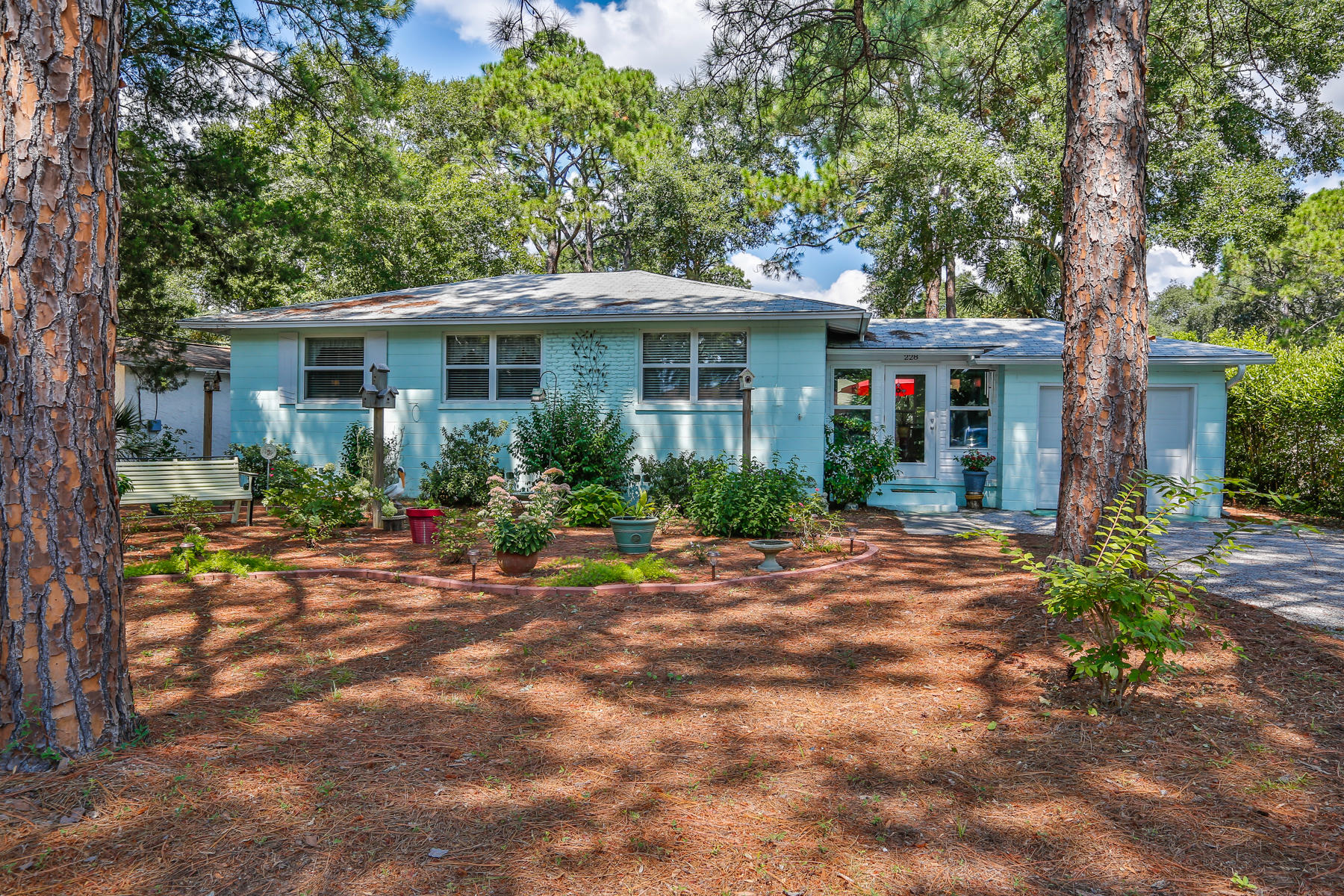 Charming mid 20th century cottage in the sought after community of Garniers Beach. Well located on Beachview Dr close to the park and bayou. Renovations in 2011 include: new vinyl windows, new asphalt roof shingles, additional full bathroom, closet, and washer dryer area, enclosed sunroom between house and garage, backyard clean up for garden with added privacy fence and well pump installed, along with multiple other interior updates in the kitchen and original bath. This property is turnkey and ready for you to move in. Come be part of this quant community.