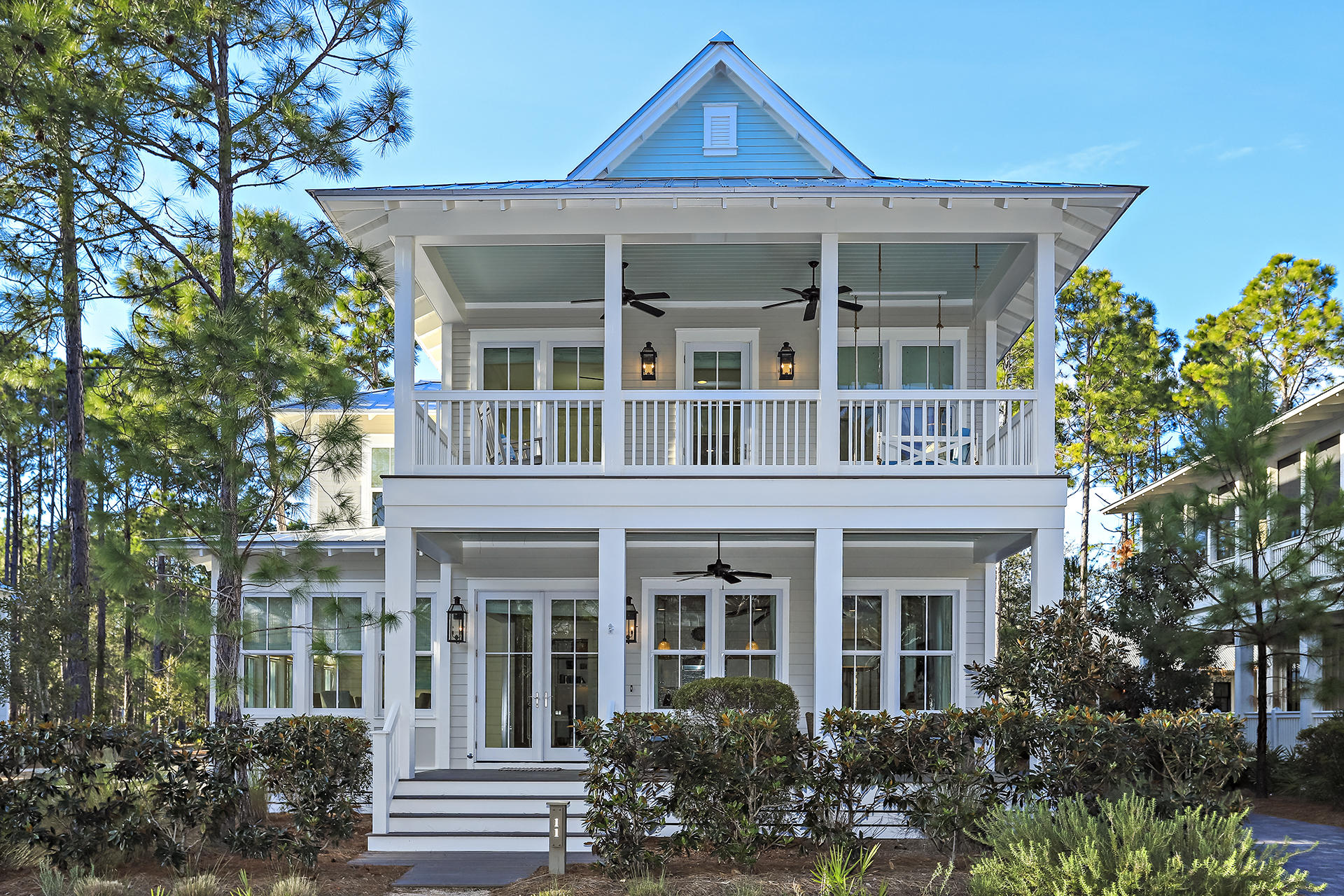 Like-New Romair Built Home with Two Master Suites, one on the Main Level and one Upstairs. This immaculate home has 4BR plus a Custom Bunk room, Sleeps 12, ample owner storage space, a large utility room, pantry and a Garage. Amazing outdoor living area with private heated pool and cabana with a shell fireplace. Stunning coastal designed kitchen has Subzero and Wolf appliances, a wine refrigerator, built-in ice maker and an oversized kitchen island. Home has a beautiful separate dining area that seats 12 and also a Outdoor Screened Dining Area. The exterior of the house was recently painted and is in great condition. There are two custom porch swings offering a place to sit and relax with views of Calamint Park. Strong Rental Projections. Special Assessment has been paid in full.