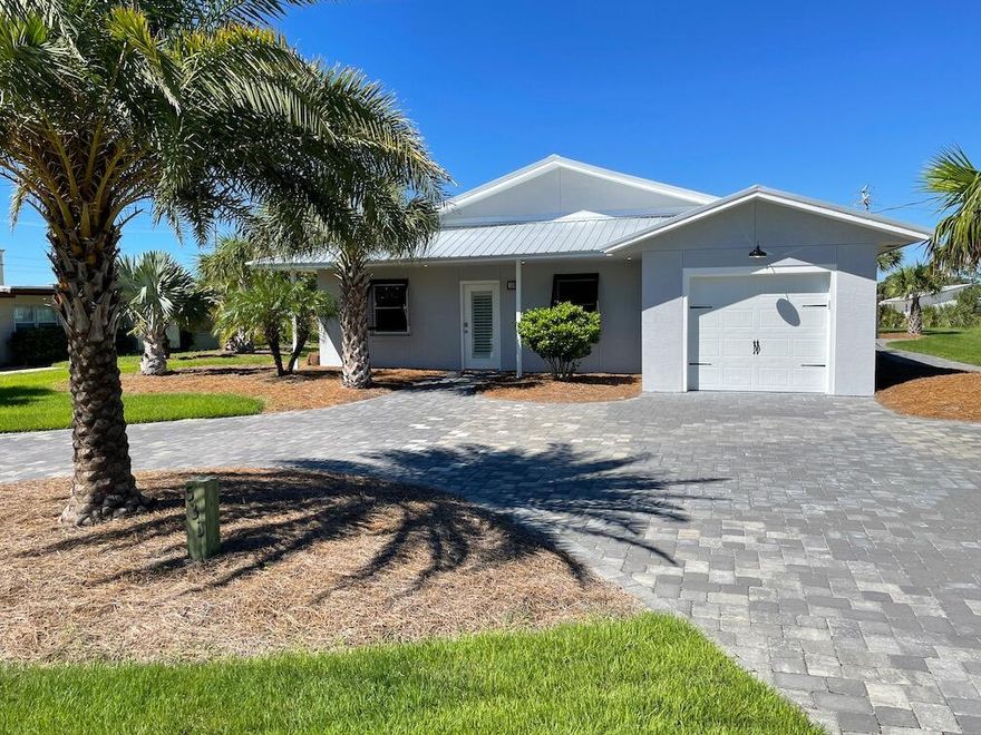PERFECT BEACH COTTAGE COMPLETELY RENOVATED/  REMODELED & READY For Your Enjoyment! Great for family's primary or 2nd home! This timeless Florida beach bungalow is tucked away on Okaloosa Island; a 2 min walk to the  sugar white sands and sparkling gulf front shoreline. This solidly built concrete & stucco home boasts exposed timber-beamed ceilings w/ tongue & groove plank work throughout. Lovely Sound Views-No HOA Fees-No Flood Insurance required. Spacious Open Floor Plan. No expense spared throughout its 2020-2021 restoration: Tropical landscaping, New Galvalume Roof, Tankless hot water heater. Hurricane impact rated windows & doors.  New 4-ton HVAC system. Completely rewired w/ new 200A electric service &LED lighting throughout. Plus