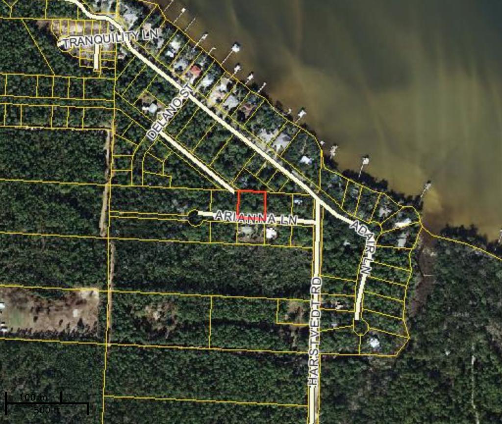 Back on the market. Reduced $9,000 - priced to sell! Bring an offer! An ideal homesite for quiet peaceful living. Lots of big trees. Road is secluded; within walking distance to the Bay. 5 minute drive to Publix; 10 minutes to restaurants, 15 minute drive to the beach.