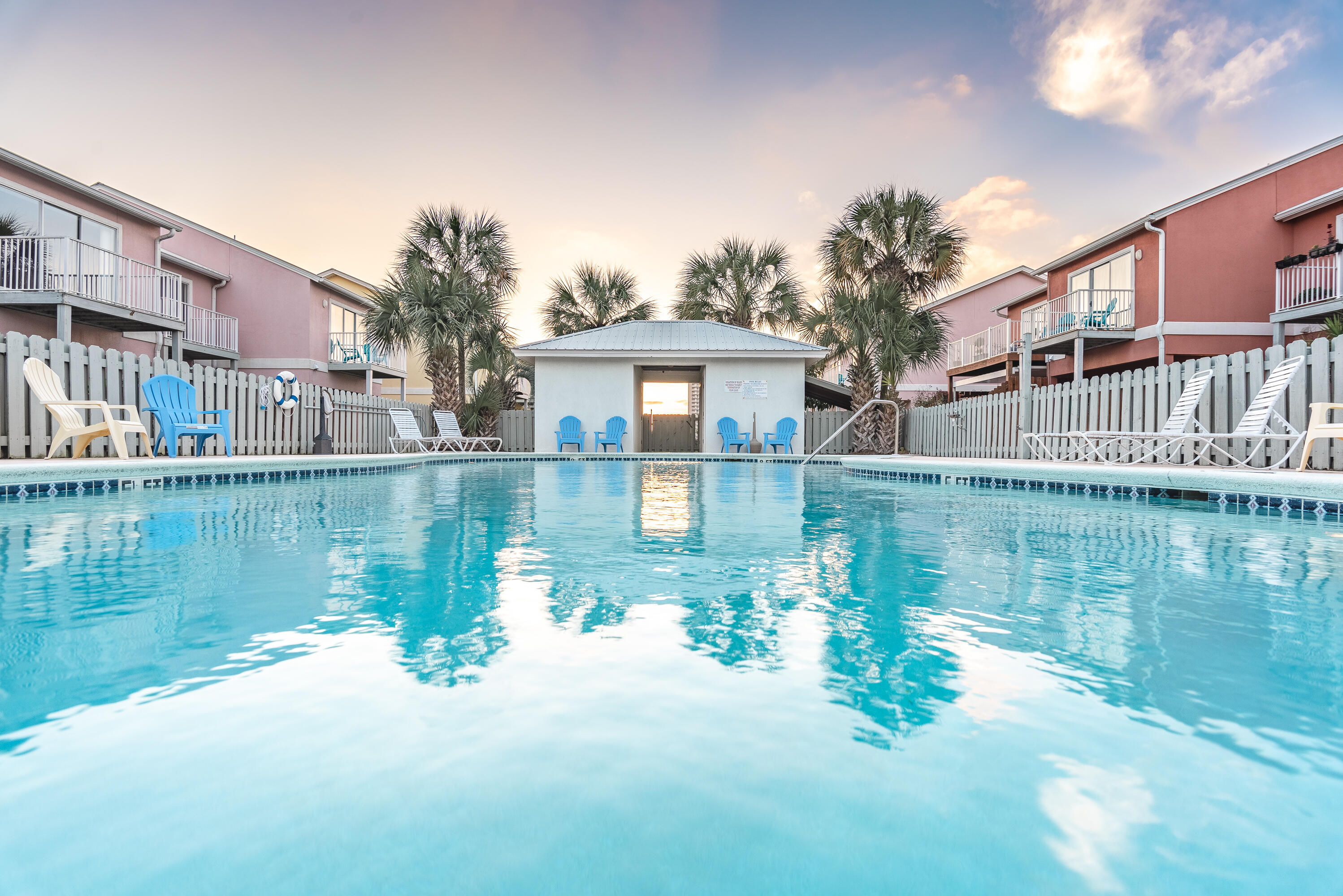 This 2 bedroom 2.5 bath town home is tucked away in a private neighborhood yet very close to the beach. Flooring downstairs is new. It is really a must see and it won't last long. Can be used as your primary residence, second home or vacation rental. All dimensions to be verified by the Buyer.