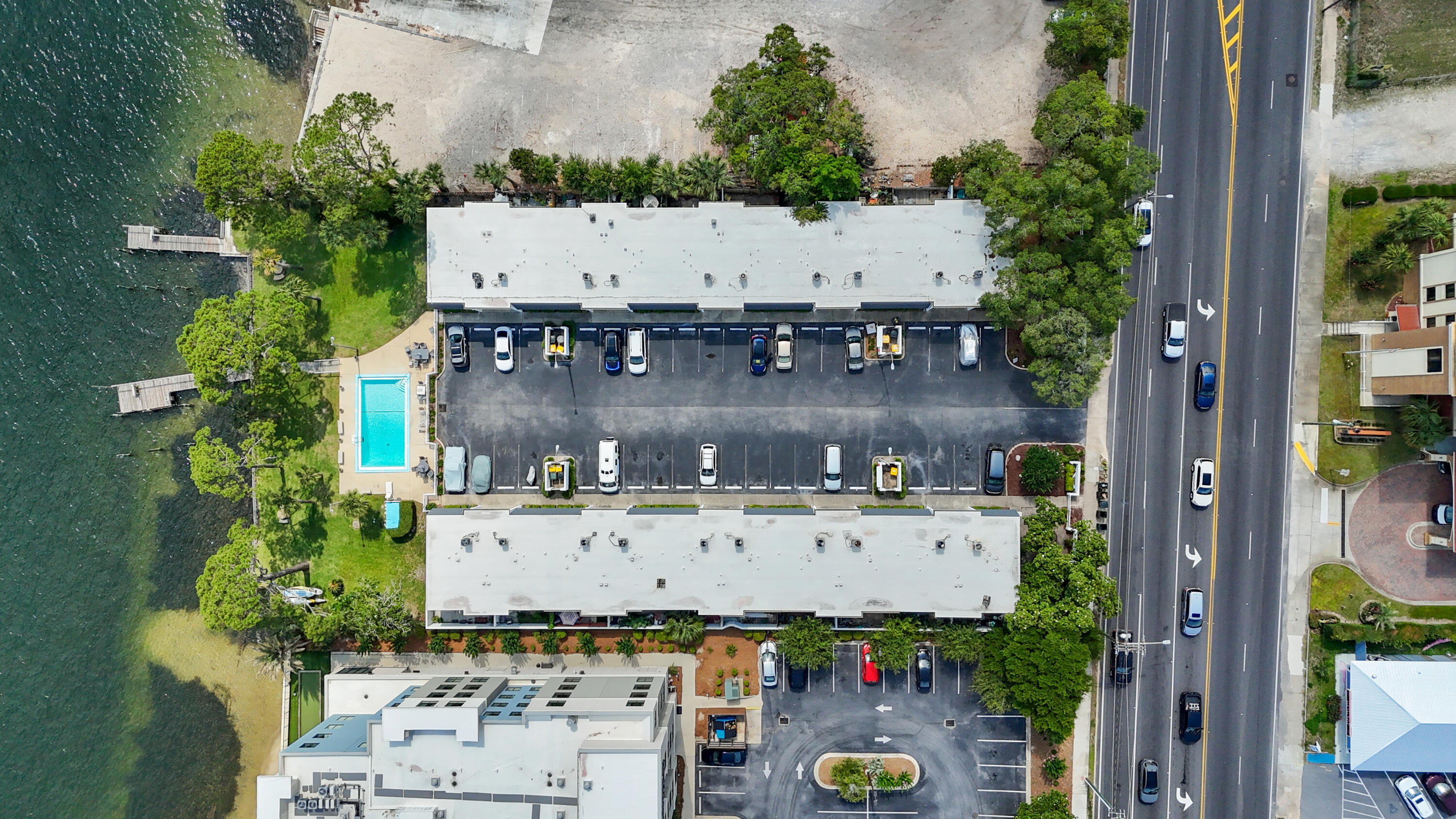 Welcome to Casa Del Mar, a charming community in the heart of Fort Walton Beach - a classic coastal town that feels up-and-coming! Only minutes from the beach, dining, and local fun, this two-story townhome offers comfort and convenience. Upstairs fully remodeled in 2022 with two bedrooms, stylish full bath, new HVAC, and ductwork. The oversized picture window fills the space with natural light. Downstairs features saltillo tile, full bath, kitchen, and living area with double hurricane-impact sliding glass doors leading to private patio. Amenities include two docks, a sparkling pool, two reserved parking spots, and kayak storage. No short-term rentals. Copper rewire, new fridge, dishwasher, washer, dryer, and water heater (2017). Come see why homes in Casa Del Mar rarely hit the market!
