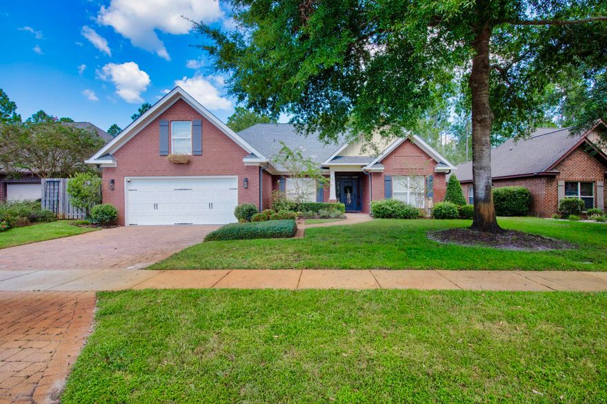 Nestled towards the back of the community Symphony, this 5 bdrm, 3 bath home boasts of an open concept. Split floor plan where the master suite and 2nd floor bonus room/guest bdrm on one side & guest bdrm and guest bath on the other. Master bath has dbl vanity w granite counter-tops, soaking tub and walk-in shower.  Master bdrm has french doors that open to the back yard.  Within the past 2 years, new LVT flooring was installed throughout, new lighting in most of the rooms, interior home repainted along with kitchen cabinets and new appliances. Appreciate your kitchen with plenty of cabinets, granite counter-tops, gas stove and barhop breakfast seating.  An area for a coffee bar, wine cooler and breakfast nook that has access to the grilling patio. A new HVAC was installed in 2021, new roof and refrigerator was updated in 2024. Enjoy your gas rinnai for continuous hot water when in use. With the privacy of your fenced-in back yard, you have a large brick paved patio with an  outdoor grill and fireplace.  The 2-car garage has an additional 484 sq ft  heated and cooled with a mini split to keep it cool in the summer and warm in the winter.  Home is sold "unfurnished" and concrete angel in front of the home does not convey  Hammock Bay amenities are many, canine walking park, swimming pools, restaurant, community center, and much more. Home is sold unfurnished and angel statue does not convey in front of home.   Buyer(s) are responsible to personally verify all details for property and dimensions. Any information contained in this listing is believed to be accurate but is not guaranteed.