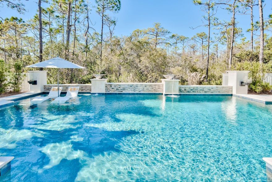 UNDER CONTRACT BUT ACCEPTING BACKUP OFFERS! A resort style private oasis with a HEATED Saltwater Pool; perfect for entertaining! Never been rented and meticulously maintained as a second home.  This stunning property is projected to bring in 93k in annual rentals, making it a lucrative investment for any second home or vacation rental.  This professionally decorated and furnished Wind Chime plan offers 2,717 square-feet, 4 bedrooms, 3 baths, with a spacious loft that can also be made a bunk space, 1 car garage and 2 owner lock out closets. With very few homes in NatureWalk with a pool, take advantage of this opportunity for your own private beach retreat before it is too late. This premier location offers accessibility to area restaurants and Publix just right next door.