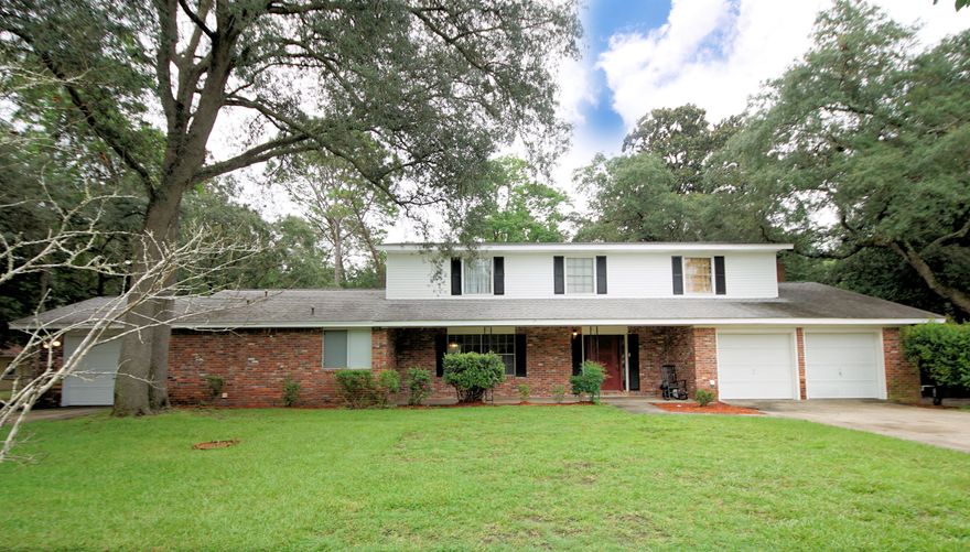 Back on market - no fault of sellers. KENWOOD! Sunshine and family-sized space in this impressive 6 bedroom 3.5 bathroom home right around the corner from Kenwood Elementary School and park. This in-demand neighborhood offers a wonderful opportunity for you to call home. With loads of personality, this home delivers ample living space downstairs, 2 living rooms, kitchen, dining room and large master bedroom downstairs. Wood plank tiled throughout the downstairs.  The upper level is dedicated to 5 additional bedrooms and 2 full bathrooms. New flooring in the bathrooms upstairs and new carpet upstairs. 3 Car Garage, 2015 roof, 2009 HVAC, make your move on a charming and sizable residence in the heart of Fort Walton Beach.