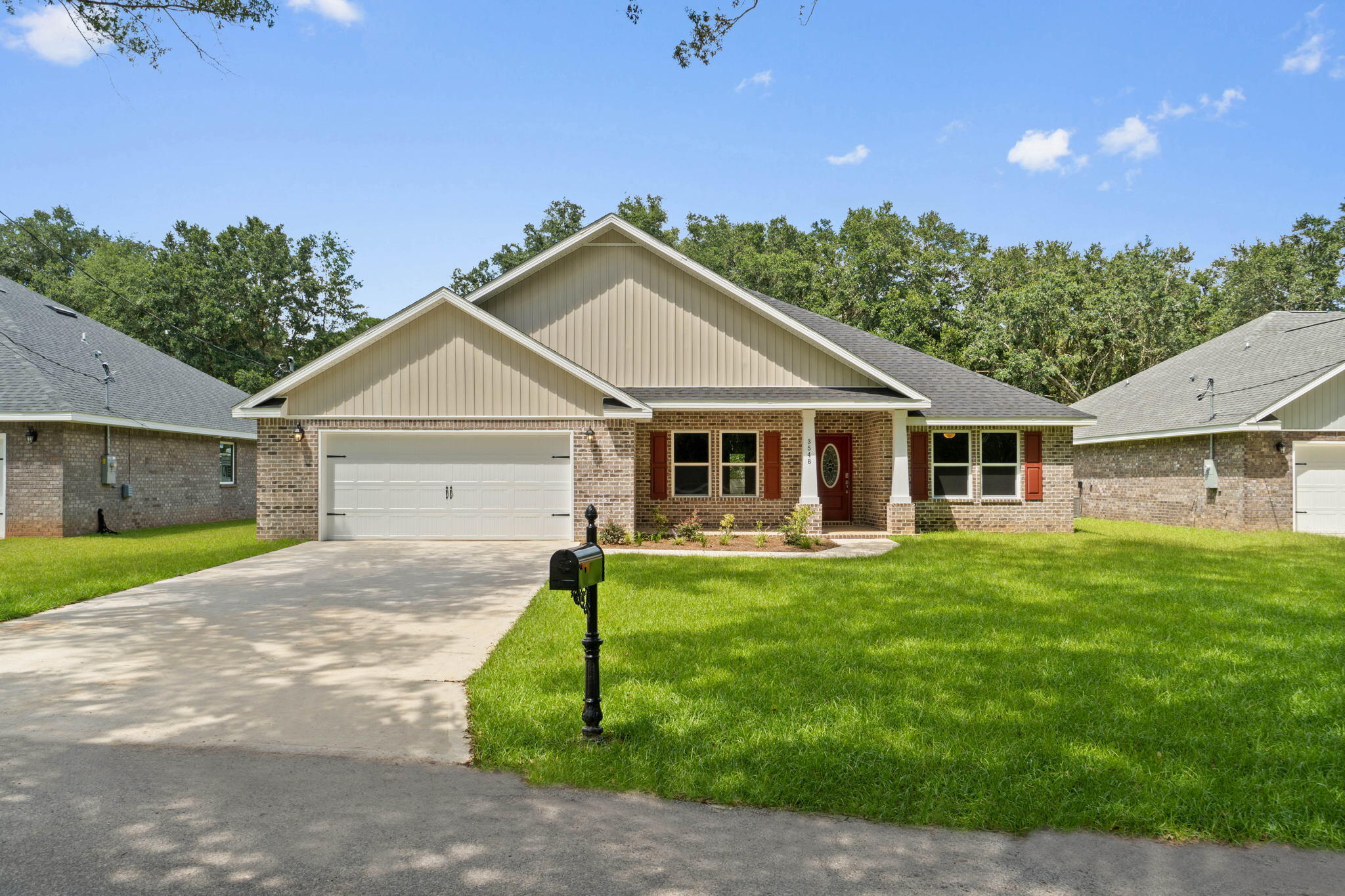 Welcome to Secret Isle! Some are calling it, 'THE most secluded neighborhood in Navarre.' A natural preserve surrounds Secret Isle which assures that nothing will ever be built directly behind the homes in the neighborhood which gives an extra sense of privacy and seclusion. This one-of-a-kind development is located just off Hwy 87, minutes from shopping, restaurants, A+ Schools, and the sugary white sands of Navarre Beach. The 'Turquoise' plan is one of the five home styles being built in Secret Isle. This affordable 5 bedroom, 3 bath brick home offers an open floor plan that you'll love. The spacious living room, dining room, and kitchen area makes it ideal for gatherings. You will find scratch/water resistant Luxury Vinyl Plank Flooring throughout, with carpet in the bedrooms. The kitchen includes stainless steel appliances, granite countertops, bar seating, solid wood soft close cabinets/drawers, and is elegantly detailed with brushed nickel hardware.  The free-flowing floor plan offers the grand master suite with trey ceilings and a luxurious master bathroom that boasts a garden tub, separate all tiled shower, double vanities, and two large walk-in closets. Are you going to be one of the few to call Secret Isle Home? Call today for additional details! Photos of a similar home. Check out the 3D tour!