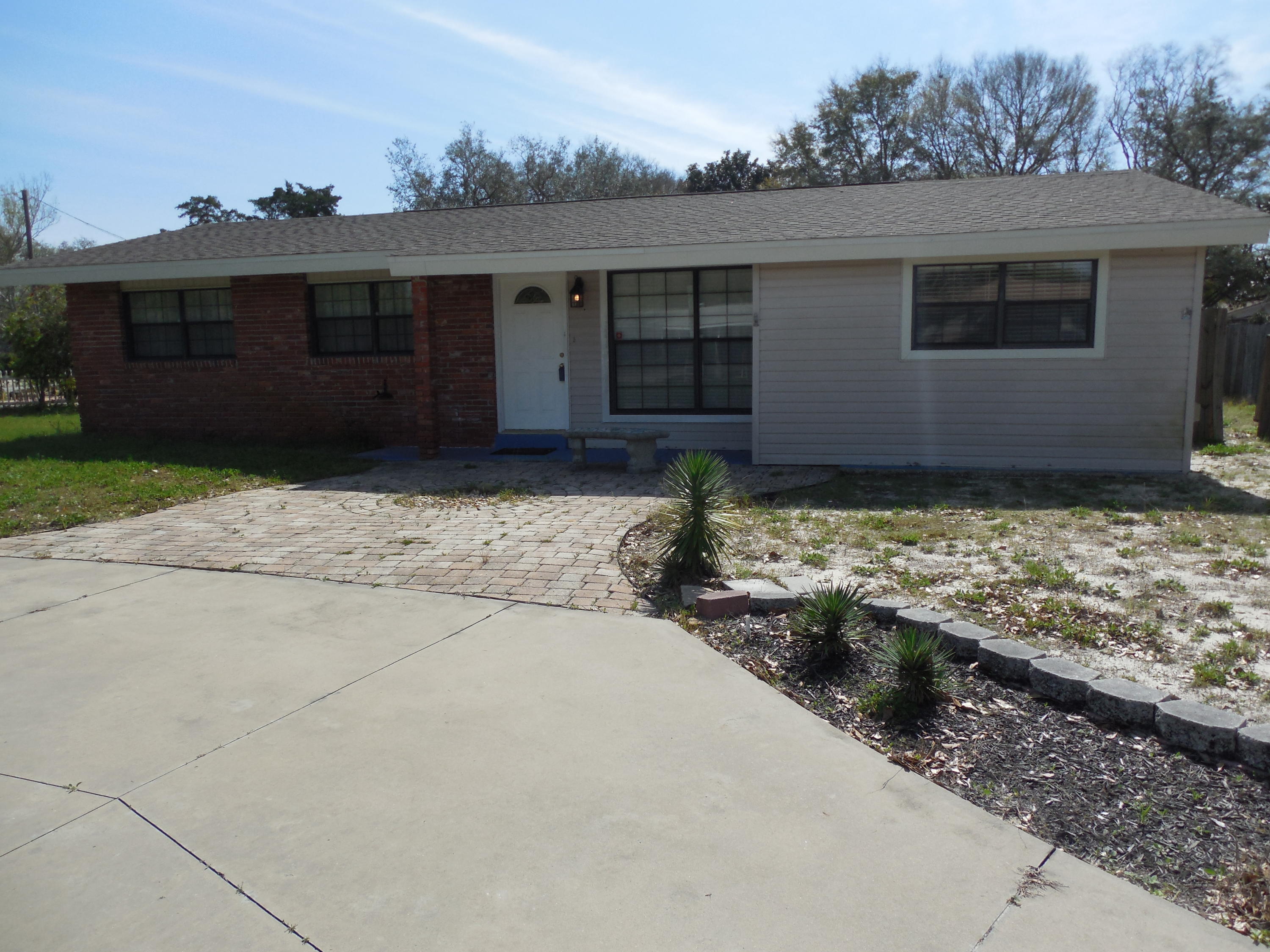 Perfect opportunity with tons of potential is waiting for a new owner!This home is nestled in Springdale Subdivision just East of Hurlburt Field. This would make a great starter home for anyone! Within close proximity to Mary Esther Elementary, Brunner Middle, and Fort Walton Beach High School. Best of all, this location also gives you the option to avoid 98 traffic by taking side streets to Hollywood boulevard. This is a 3 bedroom 1.5 bath. Tile in the living area, and carpet in the bedrooms. The yard does have an irrigation system. The backyard has a shed with a window AC unit. U turn driveway allows for up to 5 parking spaces or more! Springdale Subdivision has a community garden at the baseball fields.