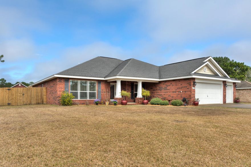 This incredible four bedroom 3 bath home in Holley By the Sea sits on a large lot (.46 acre) with a 3 car garage and a workshop. When you open the front door you will be impressed by the open floor plan, 10' ceilings, beautiful hardwood floors, large dining room, separate office and a view through the open concept living room to the covered patio. The gourmet eat in kitchen with center island is complete with double ovens, stainless appliances, a walk in pantry, and an abundance of storage! The master retreat has a tray ceiling and the bath is expansive with a separate soaking tub and tiled shower (with duel shower heads and a seamless glass enclosure) and 2 walk in closets. Make an appointment to see this home in person and check out the *VIRTUAL TOUR*