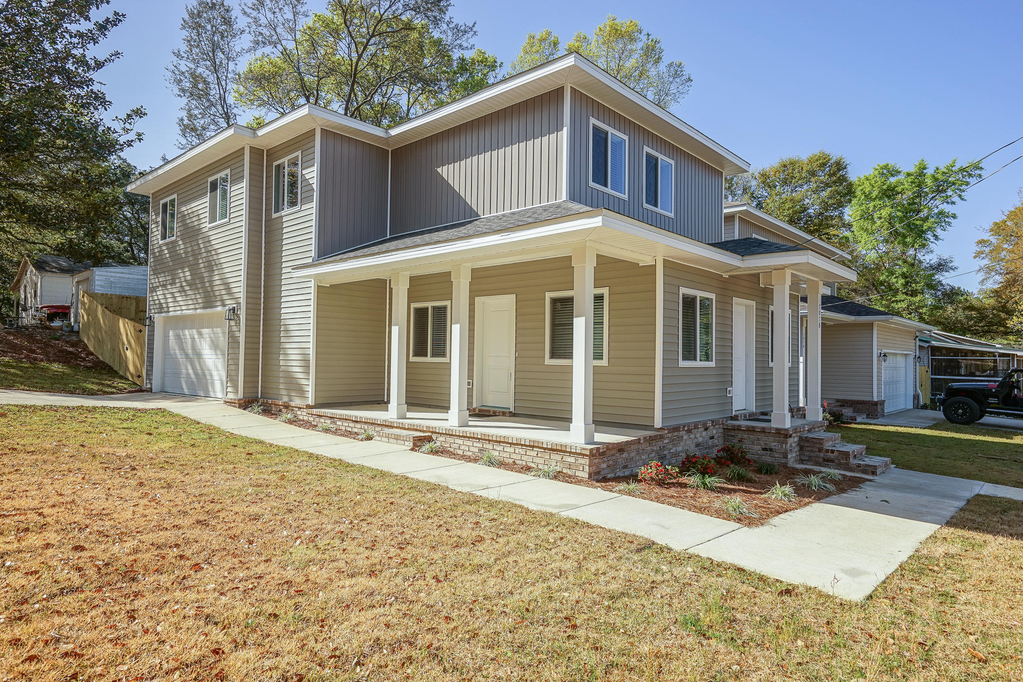 Right in the heart of Niceville. This newly built home offers an open floor Plan featuring Granite Counter tops. Custom Cabinets in Kitchen as Bathroom. Stainless Steel Kenmore Appliances, Refrigerator 3 Door. Upgraded Laminate flooring on first floor. 2nd Floor New Carpet , between floors includes dense noise abatement insulation. Stairway carpeted. Double Vanities in Master and 2nd Bath., Laundry Room 1st Floor. Abundant storage throughout. Rinnai Water System. Fenced Back Yard. Sprinkler System. 20' Side Covered Porch. Oversize Side load Garage. Vinyl Siding., Seller pays Title, Doc on Deed, Survey. One Year Builder Warranty. Central Electric Heating down.Gas Heating 2nd Floor. Brick surround and Brick Steps to entrance. AN EXTERIOR DOOR WILL BE ADDED FOR ENTRANCE TO GATED YARD.