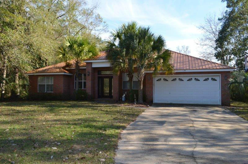 This wonderful waterfront home on Mallet Bayou and minutes by boat to the bay, could be your new home. Enter through beautiful leaded glass doors to this well-maintained, family friendly, 3 BR/2 BA brick home. Designed with the popular split bedroom plan the home has high ceilings, fireplace, great room ,formal dining room and kitchen featuring granite counters, breakfast bar and breakfast nook facing the water. The master bedroom faces the bayou and opens to the screen porch.What a great way