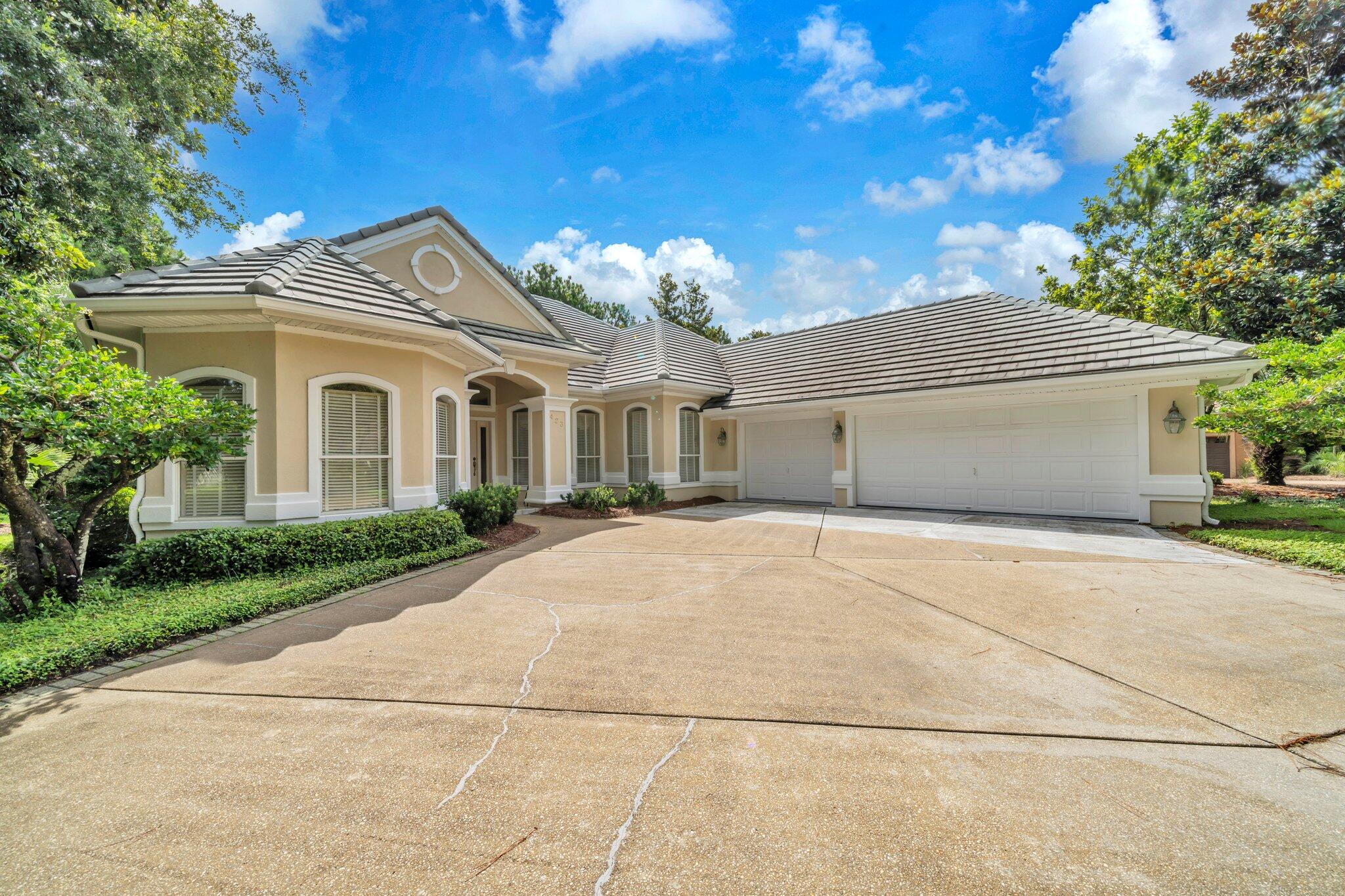 Welcome to this beautifully maintained one-owner home nestled on a quiet, tree-lined street in the prestigious Regatta Bay Golf & Yacht Club. Offering 3 spacious bedrooms, 3 full bathrooms, and over 2,600 square feet of well-appointed living space, this home combines comfort, elegance, and unbeatable location.Step inside to a bright, open floor plan perfect for both relaxing and entertaining. The gourmet kitchen flows seamlessly into the living and dining areas, all overlooking your private backyard retreat. Enjoy sunny Florida days from the sparkling pool, surrounded by lush landscaping and a serene setting.Just minutes from the beach and bay, and located within a gated golf cart-friendly community with top-tier amenities -- this is resort-style living at its finest.