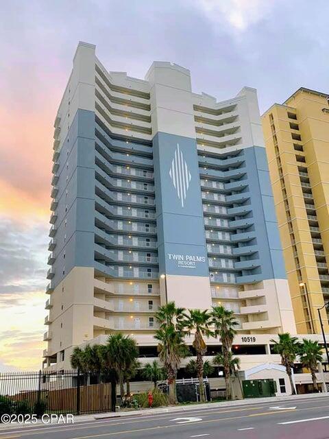 Step into luxury with this stunning 2-bedroom, 2-bath penthouse in the highly sought-after Twin Palms Resort! Perched on the 22nd floor, this unit offers unparalleled, panoramic Gulf views from its oversized, rounded balcony--one of the best views in Panama City Beach!Completely renovated, this condo features a chic, mid-century modern design with modern shiplap accent wall and sleek barn doors that add both style and character. The bathrooms are to die for, boasting luxury finishes and spa-like touches. The spacious layout surprises with more-than-expected storage and TWO owner's closets--a rare find in a condo. Offered fully furnished and rental-ready, this unit is a turnkey investment opportunity, consistently getting reservations as a successful vacation rental.