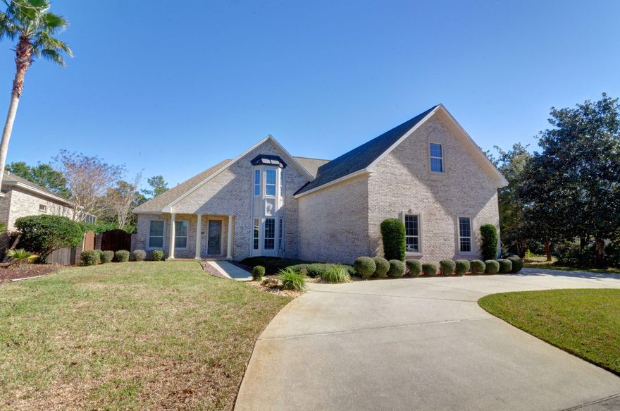 WELCOME HOME! This EXCEPTIONAL, completely renovated, 5 bedroom, 3.5 bathroom pool home is an entertainer's PARADISE! The sellers have spared no expense and it shows! The first floor features GORGEOUS wood-look tile throughout the main living areas. Entertain your guests in your LARGE Chef's Kitchen complete with granite, glass mosaic backsplash, state of the art stainless steel appliances to include a 5 burner GAS STOVE, double wall ovens and WINE FRIDGE. The great room features 20' ceilings and large windows to bring in tons of natural light. Bring your family together under your new COVERED PATIO! Host a cook out in your new OUTDOOR KITCHEN complete with custom cedar cabinetry and take a dip in..