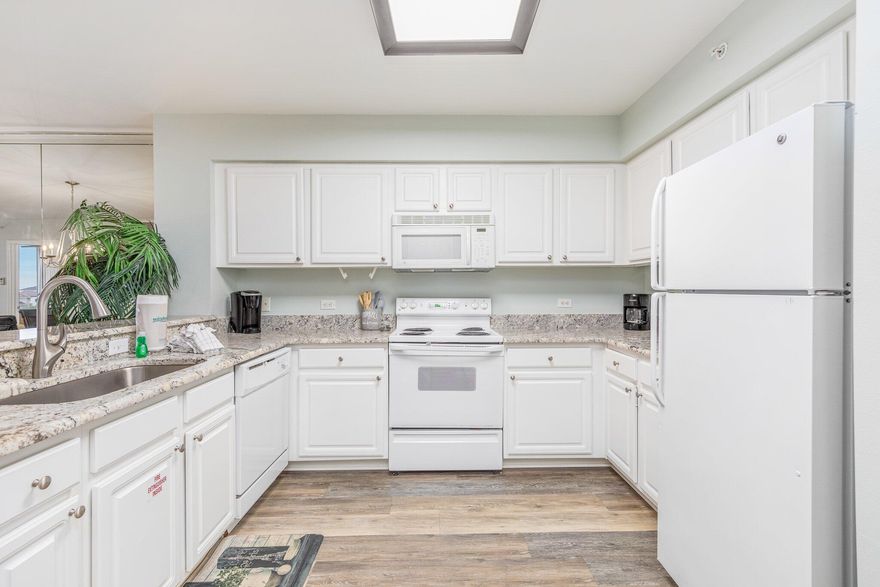 You will be so excited to call this condo your beach getaway! This is a large 2-bedroom unit with 1,072 sq. ft. well-appointed with beautiful views overlooking the pool, onsite lake and the Gulf of Mexico. You will walk in & never want to leave.
This Resort is incredible offering you deeded beach access, 3 pools - one heated seasonally. There is also a Sauna/Steam Room and you will want to take advantage of bar-b-que grills, fitness area, tennis, community room, or walking on the amazing beach.
This unit, #404, has gorgeous high-end flooring throughout the condo, GRANITE countertops in the kitchen, a large master bedroom that looks out toward the gulf and has a private entrance to the balcony. The Family room is open and perfect for entertaining. The cherry on top of this