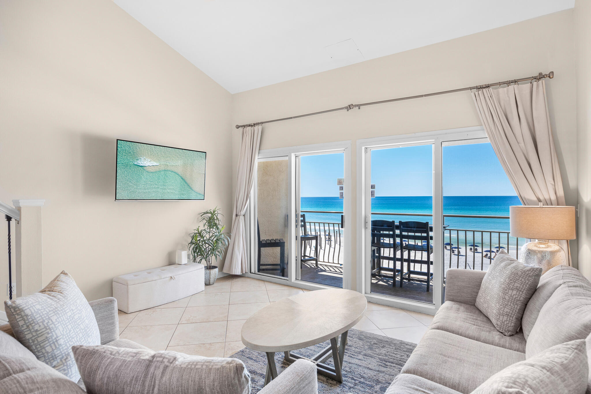 Welcome to Crystal Sands, a low-density Gulf-front development in the heart of Crystal Beach, Destin. This beautifully updated 2-bedroom, 2-bath condo in the West building is a prime rental investment, generating nearly $85,000 annually. Featuring vaulted ceilings, breathtaking Gulf views, and luxury vinyl & tile flooring, this spacious unit includes a lofted bonus room and sleeper sofa, accommodating up to 8 guests. The kitchen boasts updated countertops, new stainless steel appliances, and sleek cabinetry, while the fully furnished interior showcases fresh coastal decor & flat-screen TVs. Enjoy stunning sunsets and Gulf breezes from the private balcony, with panoramic views from the kitchen, dining, and upper level. Turn-key investment and prime location near many conveniences! The primary suite on the main level includes a king bed and ensuite bath, plus a stackable washer & dryer behind a charming barn door. Upstairs, a second king bedroom with barn doors offers stunning Gulf views, accompanied by a full bath and a bonus room with twin beds. Throughout the unit, updated lighting and fans complement upscale furniture, creating a modern yet relaxed ambiance in this low-density complex. The soaring vaulted ceilings enhance the spacious, open feel.

Crystal Sands offers two pools (one heated seasonally), gated beach access, a beachside grilling area, and on-site beach service with rentals for umbrellas, chairs, kayaks, and paddleboards. Ideally located along Scenic 98, you're minutes from Henderson Beach State Park, Destin Commons, Whole Foods, and HarborWalk Village. Walk or bike to local favorites Camille's and Soleil, or take a charter cruise or fishing trip from the nearby HarborWalk marina. Don't miss this turnkey, high-ROI opportunity. Start living the Crystal Beach lifestyle today!

