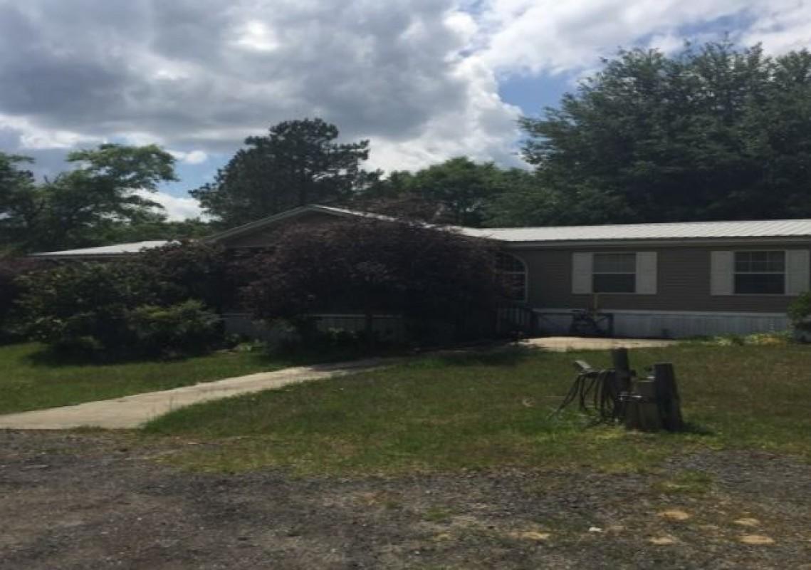 4/2 mobile home on acres.