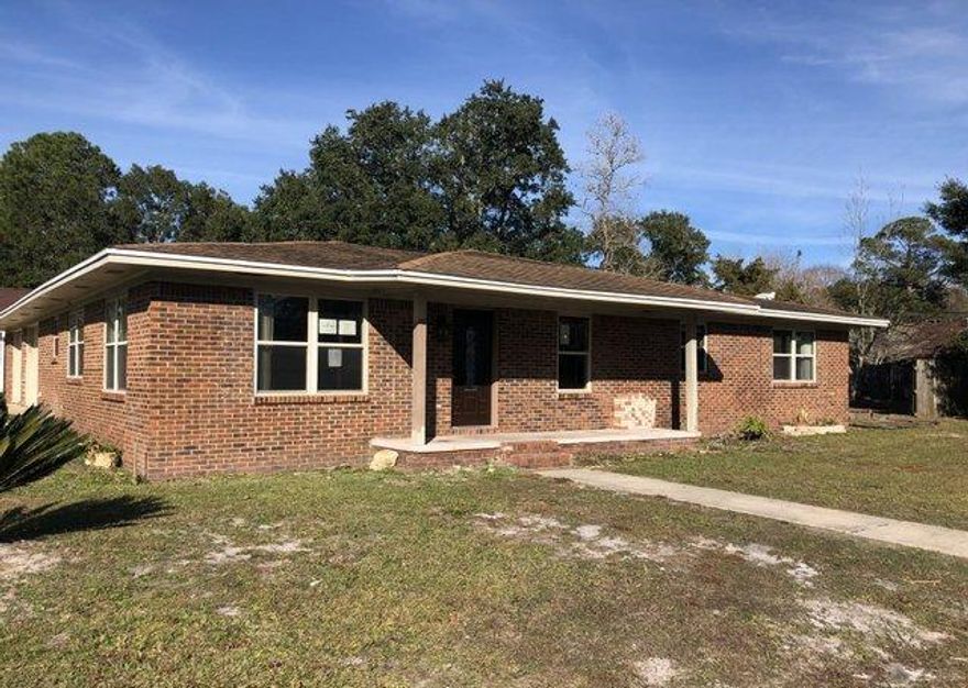 REO. Spacious all brick ranch on large corner lot in Ft Walton Beach. Home has a brand new HVAC, living room with fireplace, fenced back yard, & the ridge vent cap on roof was replaced. This property is eligible under the Freddie Mac First Look Initiative through December 31, 2019.