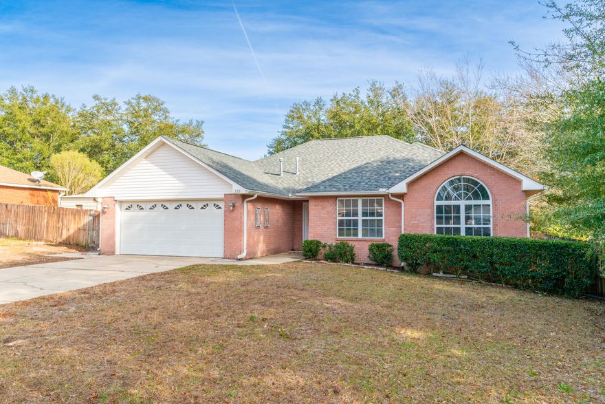 PRICE REDUCTION AND VA ASSUMPTION OPPORTUNITY! Minutes from Duke Field, Eglin AFB, Hurlburt and a quick drive to the most beautiful beaches, this 3-bedroom, 2-bathroom home is tucked away in a quiet cul-de-sac in the south end of Crestview. Step inside to discover a spacious living room with impressive vaulted ceilings. The kitchen features ample cabinet space, a breakfast bar, and a walk-in pantry. Adjacent to the kitchen, there's an additional dining area over-looking the privately fenced backyard. The master suite boasts a double vanity, stand-up shower, soaking tub, and an oversized closet. Enjoy the outdoors on your screened-in porch or the extended patio area with plenty of yard space for fun with pets and kids. 2022 ROOF, 2022 Water Heater and 2016 HVAC.