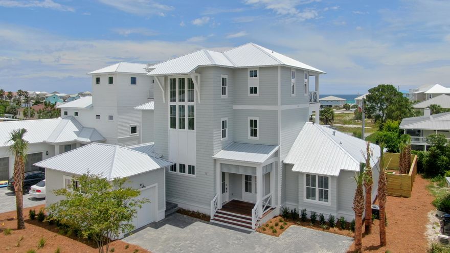 Dreamed of a 30a coastal retreat? Look no further than than this fully furnished brand new, 3 story beach house with Gulf views and a backyard oasis few homes can match. You will notice luxurious details and amenities throughout this magnificent home. Quality touches include beautiful ship lap walls, wide plank wood floors and an amazing kitchen with custom cabinets. This home offers a garage, large laundry room and generous pantry and closets. Whether looking for a vacation rental, second home or full-time residence, this home has what you are looking for. Just a short distance to public beach access, and with a private pool, fire pit and built in outdoor kitchen, you don't want to miss this Seahorse Circle gem!
