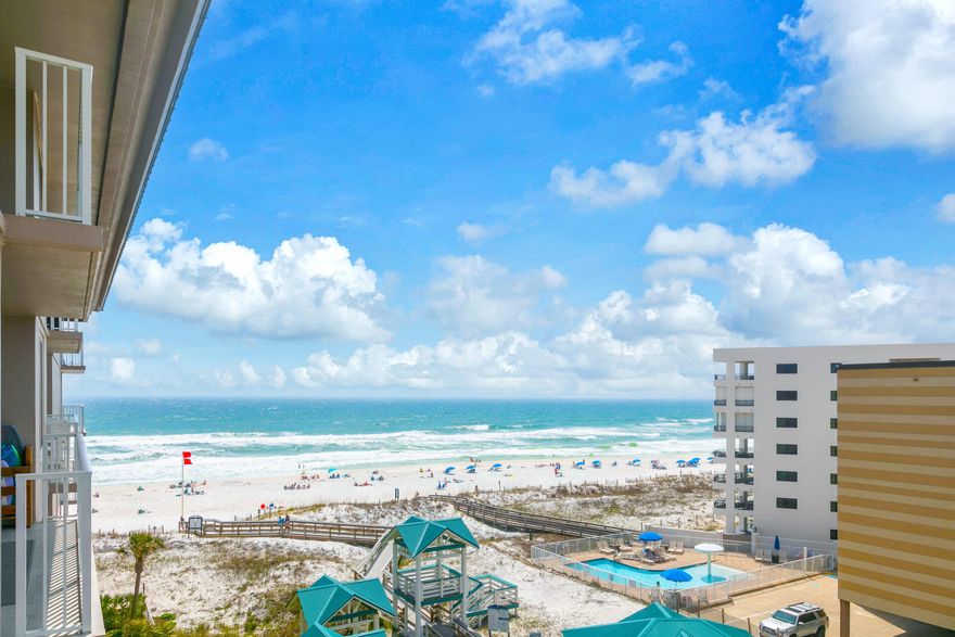 This lovely beachfront  condo is your ticket to the fabulous beach lifestyle. Beautiful view of the surf and sand of the Gulf of Mexico from the balcony. You can even get a peek of the bay. Plenty of room for the family with a King bed, hallway bunks, and  sleeper sofa. You can also take advantage of vacation rentals.  The kitchen boasts a granite counter top, stainless appliances and updated cabinets.  The bathrooms have updated vanities with a double vanity in the full bath.  The ''Beachy Chic '' decor really makes this condo pop. Great ammenities include beach access, pool, hot tub, gym, community area and more. Many fun restaurants and attractions in the area.