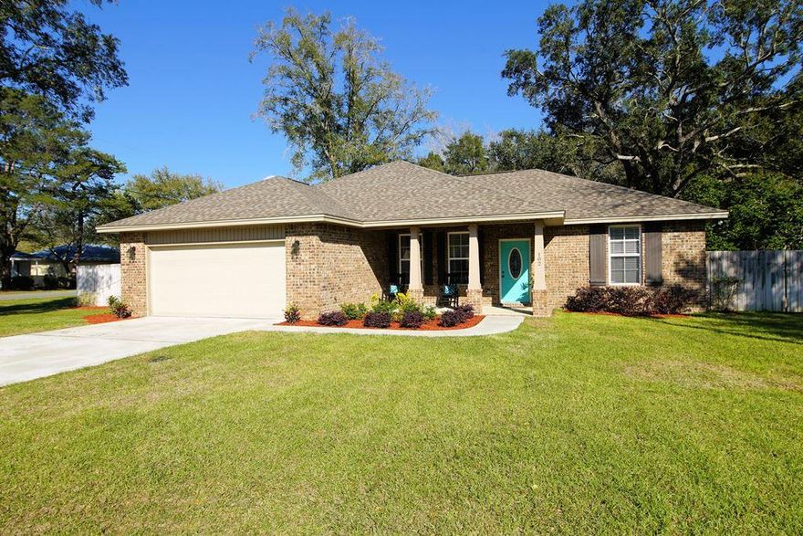 Better than new home located on a .23 acre corner lot in central Niceville. This 2016 built home is move in ready for its lucky new owner! The open floorplan is enhanced by high ceilings and gorgeous hardwood floors and because this is a split floorplan home the master suite is on the opposite side of the house from the two additional bedrooms. The good sized family room can accommodate oversized furniture and it is open to the dining area and kitchen. The kitchen features an abundance of beautiful cherry cabinets as well as plenty of granite counter space. There is a convenient breakfast bar between the family room and the kitchen...the perfect place for informal meals. The back yard is shaded by large trees and there is a double gate on the 26th street side which is the perfect place to