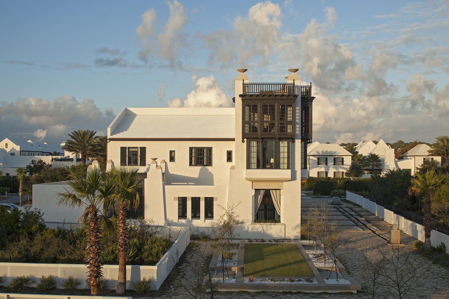 This 3 bedroom, 3.5 bath Mediterranean celebrates an al fresco lifestyle and offers the same level of escape. Located on the Beach Side of Alys Beach, the home features a 4 story tower with unparalleled views of Sea Garden Park and the Gulf of Mexico. Throughout are rich textures, natural elements, and a mix of old world antiquity with modern touches. The first floor great room with powder room and adjoining kitchen feature 13-foot ceilings. Just beyond is a gracious landscaped courtyard with a heated pool, 2 loggias overlooking South Sea Garden pedestrian path, and an al fresco dining court. 3 bedrooms with 3 baths, a ''secret'' bunkroom are located on the second floor. Panoramic southerly views come with the master suite and the open air Florida room above, both. Topping it all off is