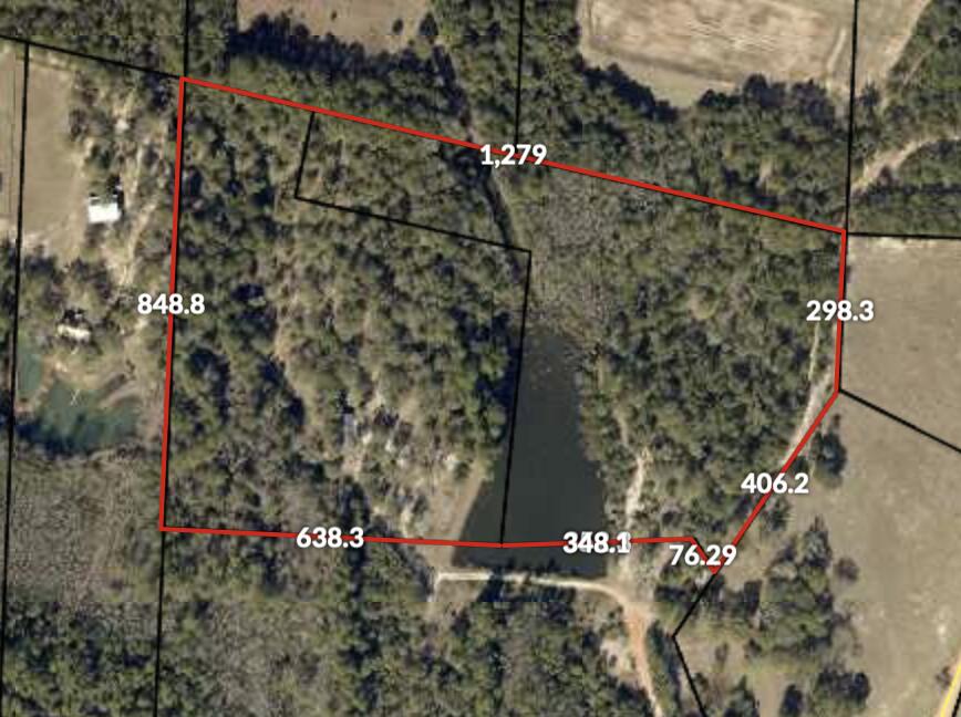 The beautiful 20 acre property features a 2 acre lake and stunning views. A great place to build a home or a weekend get away. Electric, Public Water and a Septic System are already on site. The sale consists of 2 parcels about 10 acre each. Accessed is via Hilton road and an easement over an adjoining parcel. This convenient location has easy access to Baker school as well as a short drive to Crestview. Commute to bases would be about 20 minutes to Duke field and about 30 minutes to Eglin AFB. Sale Includes 2 parcels, 18-3N-24-0000-0001-017A and 18-3N-24-0000-0001-017C.