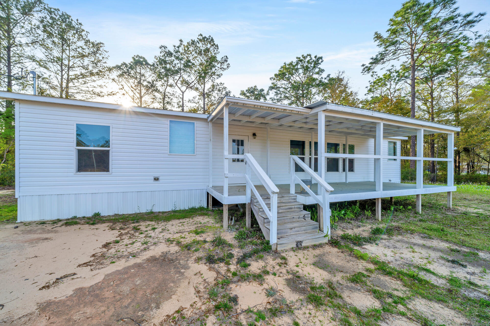 Escape to the tranquility of country living with this charming 3 bedroom, 2 bath mobile home nestled on a spacious .87-acre lot. Recently renovated with modern updates, this cozy abode offers a rare opportunity to experience the serenity of rural life without breaking the bank. With room to expand and endless possibilities, this property promises the perfect blend of affordability and comfort. Don't miss out on this hidden gem - schedule your viewing today!