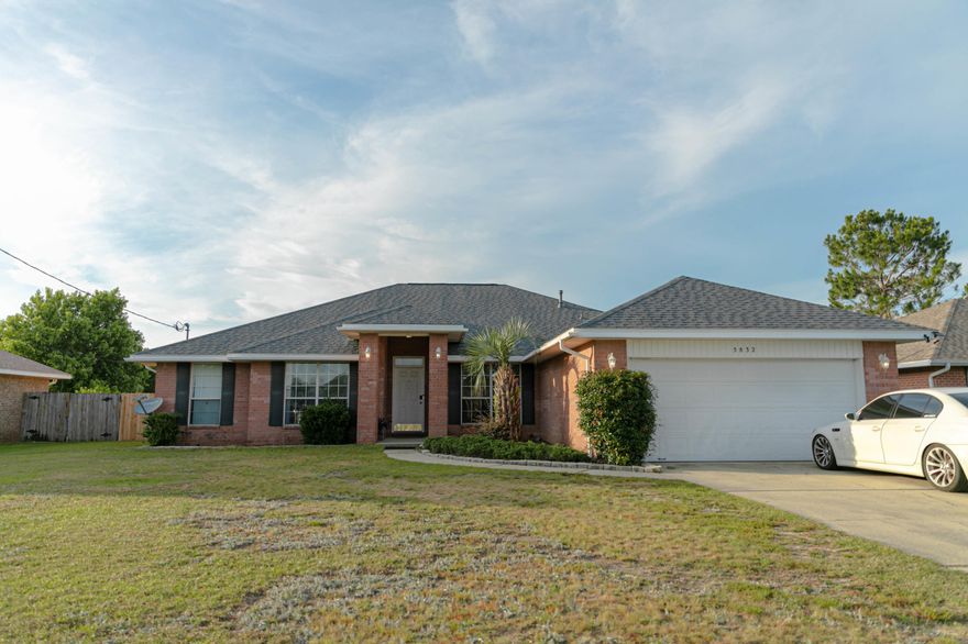 Welcome to your new POOL & SPA home, only 4 minutes from I-10! Located centrally off Avalon, this 4 bed 2 bath all brick home has so much to offer. Sitting on a quiet street, over half an acre of flat back yard to include a custom palm tree private pool setup, and much more. You'll enjoy the brand new roof installed only one month prior. Throughout the home living areas is LVP wood look flooring. As you walk through the grand foyer, you'll immediately notice the vastness of the living space. On your left is a dedicated office space with glass french doors, separate from the other bedrooms! Formal dining room on your right, leading into the immensely spacious kitchen with pool view. Stainless microwave is brand new slim fit for more cooking space. The master suite is oversized, views of the pool, and flows into the large master bathroom. Inside the master suite you'll love the his & her closets, garden tub shower, and dual vanity. The tile Florida room is finished wonderfully, and features a full hot tub spa with cover. Once in the back yard, you won't have enough plans to fill all of the usable space. Behind the styled pool is land that is a dream for pets, a mechanics shop, or any recreational activity. All in all, finding a 4 bedroom home with a pool, spa, brand new roof, recent HVAC, on a quiet street and absolutely ideal for a commute into Pensacola, this home presents incredible value. Book your private showing, as there are not many choices on the market in the Avalon area before this one is gone! 