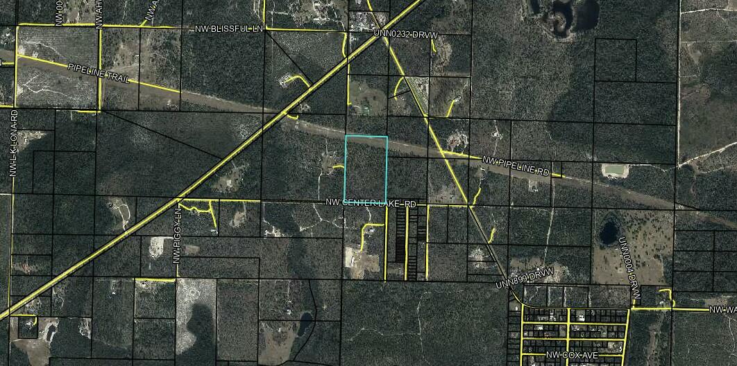 Ready to find your place in the country a short trip from the white sandy beaches of the Gulf? 15 acres zoned agricultural with a permitted driveway and septic system already installed. Property taxes only $32 per year! Perfect for someone looking to start a homestead or a quiet retreat