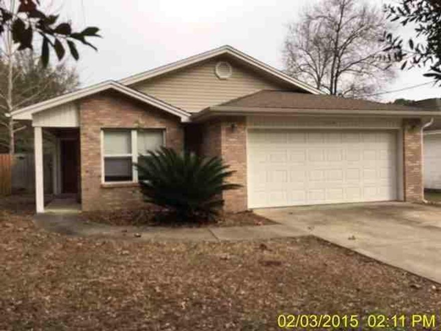 Charming 3 Bd / 2 Ba home has lots of potential for starter home. Features include vaulted ceilings in living room / dining room, tile in the kitchen double vanity in master bath & large fenced back yard with covered patio. Close to shopping, dining & schools. Don't miss this great opportunity.