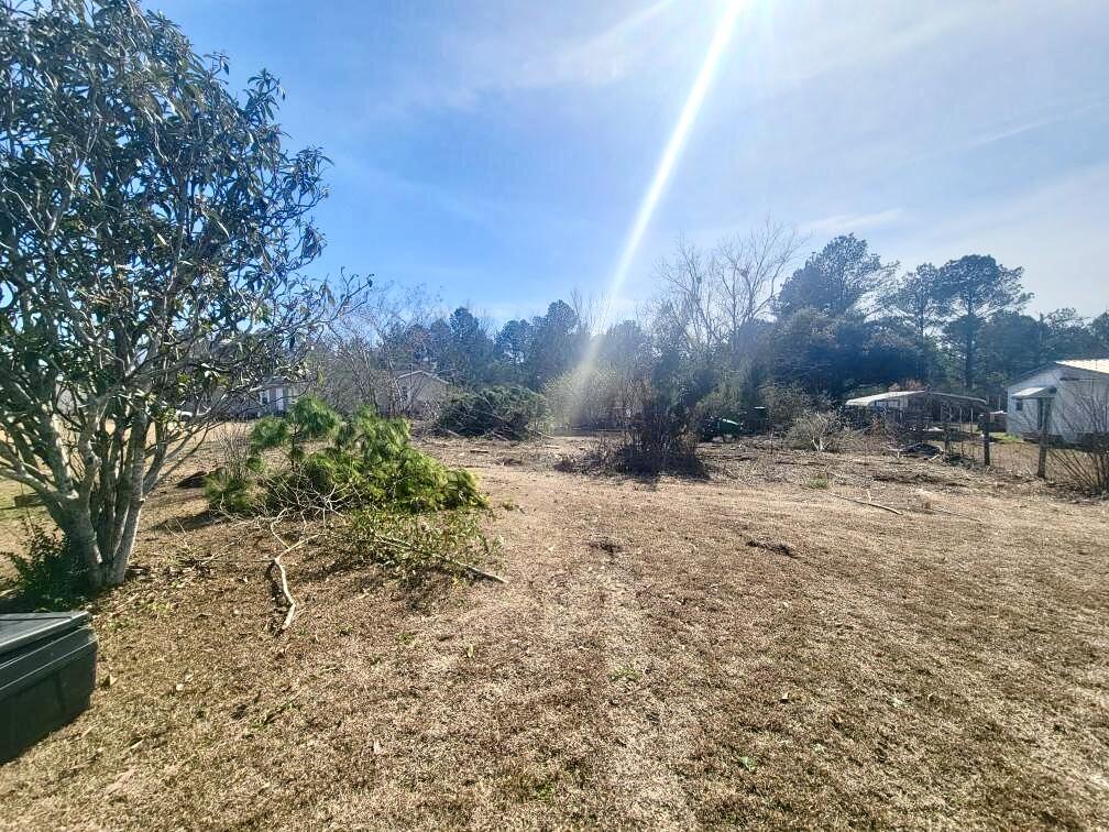Great location for a manufactured home appx. 15 minutes to Dothan, AL. Lot has been partially cleared and has a septic tank (not guaranteed, Buyer may order a septic inspection), water tap is in place with Taylor Water Dept. The real estate sign is next to the water meter. Lot has Japanese magnolia tree, Loquat and Pecan tree. Lot is also located on a paved road. Schools available in this area are: Rehobeth Elementary, Middle School and High School that service this area.