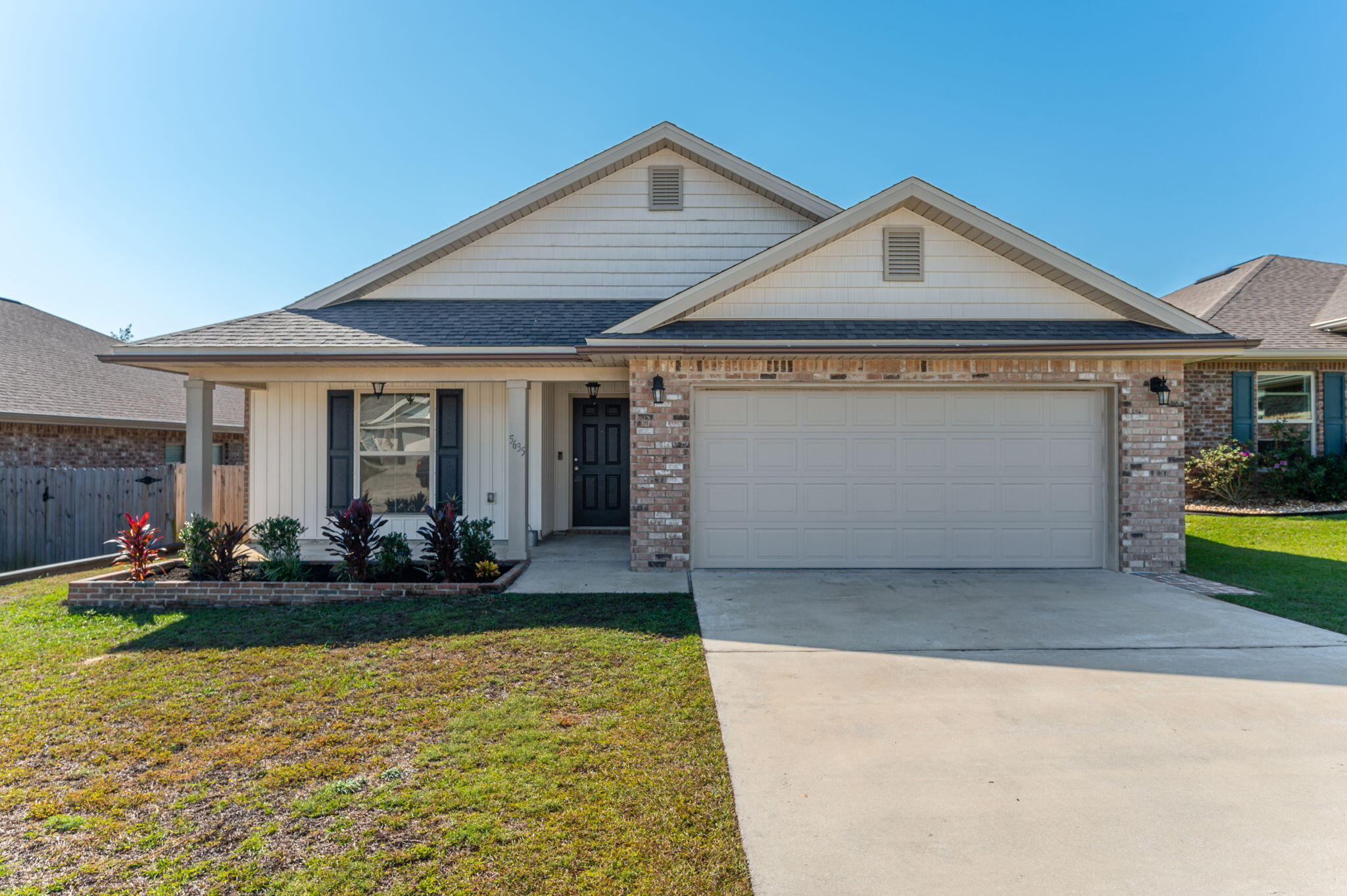 SELLER OFFERING $500.00 MOVE-IN SPECIAL.  Seller paying closing costs and prepaid items to allow a VA Buyer to move in for just $500.00!!!  Welcome to Bon View, a great subdivision located close to I-10 ramp allowing for a quick commute via I-10 and Garcon Bridge!  Incredible 3-bedroom, 2-bathroom 2019 home Featuring:  1. Open floor plan which seamlessly connects the kitchen, dining area, and living room - creating a welcoming and versatile space for family gatherings and entertaining guests.  2. Warm wood look laminate flooring in all main living spaces and carpeted bedrooms. 3. Large kitchen with wood tone cabinets and granite countertops including a large L-shaped eat-at bar. 3. Spacious Master complete with a large-enclosed shower, double sinks, and a spacious walk-in closet. 4. Convenient Built-in cabinets perfect for backpacks and jackets located just off the garage entrance. 5. Dream back yard with covered porch, and terraced back yard perfect for fruit trees, gardening and sunset evenings. 5. Fantastic home that offers all the creature comforts while being cost efficient thanks to the incredible construction.  Schedule a look in person ASAP!!!