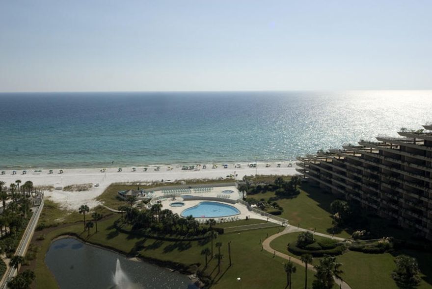 High style and low sunsets. Ultra luxury is yours in this 10th floor 4BR/4BA well-priced condominium at elegant Grand Dunes. Arrive in high speed right to your door in your own semi-private elevator. Enter your private foyer and open your front door to panoramic gulf views from your wall of windows. Relax in this well-crafted quiet space on comfortable and elegant traditional furnishings. Start dinner in your chef's kitchen with upgraded stainless appliances and granite counters. Share wine over your kitchen island with friends who are mingling in the open living and dining spaces. Enjoy gulf breezes and sizzling steaks on your wide tile balcony with built-in gas grill. This is a condo with all the comforts of a well-designed single family home including 9.5' ceilings, crown accents, custom cabinetry, plentiful storage/closets and privacy. Grand Dunes is arguably east Destin's finest luxury resort with rental restrictions, lavish landscaping, gated entry, lagoon pools, hot tubs, tennis, fitness rooms, billiards, owner's lounge with bar, private beach access and owner's guest suites. This is the best priced 4BR unit in the North Tower. Make your appointment to tour today. Buyer should verify all information contained here-in. Grand Dunes is the "Emerald Coast's Premier Gulf Front Development"!