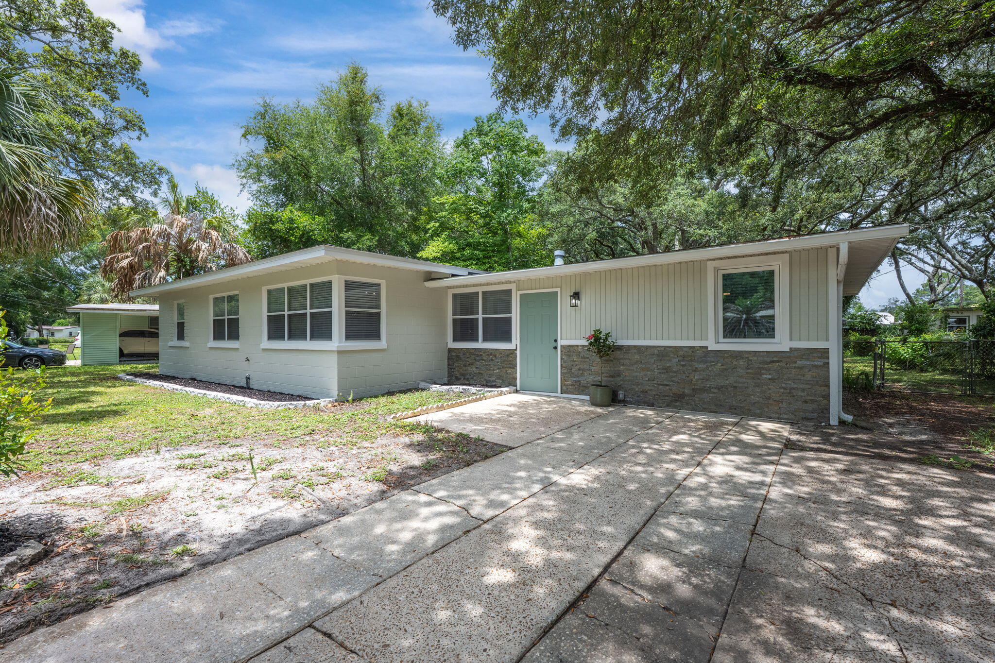 *Presented with staging furniture* Welcome to 203 Hawthorne Circle, a completely updated home with an effective date of 2005, in a peaceful, centrally located neighborhood with mature trees. Proximity to Eglin AFB and Hurlburt Field is perfect for active duty or DOD personnel. This location is also ideal for shopping and dining at many local spots such as Uptown Station and Sun Plaza. Inside the home, everything has been redone including a new roof and HVAC system in 2020 and a new water heater in 2023, so you can move in with confidence. You'll find a bright and open layout with easy-to-clean vinyl wood-style floors, ceiling fans, and plenty of recessed lighting. The kitchen is fresh and modern, featuring stone countertops, two-tone cabinets, a pantry closet, lots of storage and counter space, and brand-new stainless-steel appliances. There's also under-cabinet lighting that adds a warm touch. The main bedroom is separate from the others for extra privacy and includes a walk-in closet and a full bathroom with a tub and shower. Large windows throughout the home bring in lots of natural light. Outside, there's an extended driveway, a large, fenced backyard, and a spacious shed that's perfect for extra storage or hobbies. This home is a great find in a quiet and convenient part of town that is close to everything but tucked away from the noise.