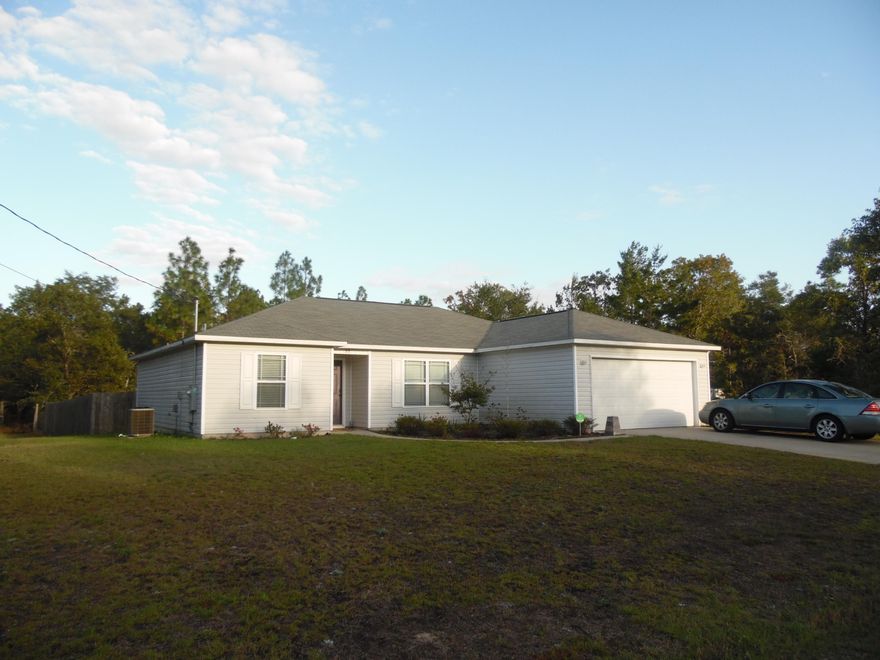 Gorgeous almost new home built in 2014, with 4 bedrooms, 2 baths, double car garage on corner lot. The total square footage with garage is 2,012. If you need more space you could convert garage easily. Within 2 miles of shopping. Spacious Living room, kitchen with extra storage, granite counter tops, double sink, all kitchen appliances go with it. Master bedroom with large bath with tub, double vanities, separate bathroom closet with commode, walk in closet. Split floor plan with front bedroom (could be used for an office), then bedroom #3 & #4 with hall bath between them. Back deck with fenced backyard almost all privacy fencing. Double car garage. Entire home still looks brand new...easy to show call today.