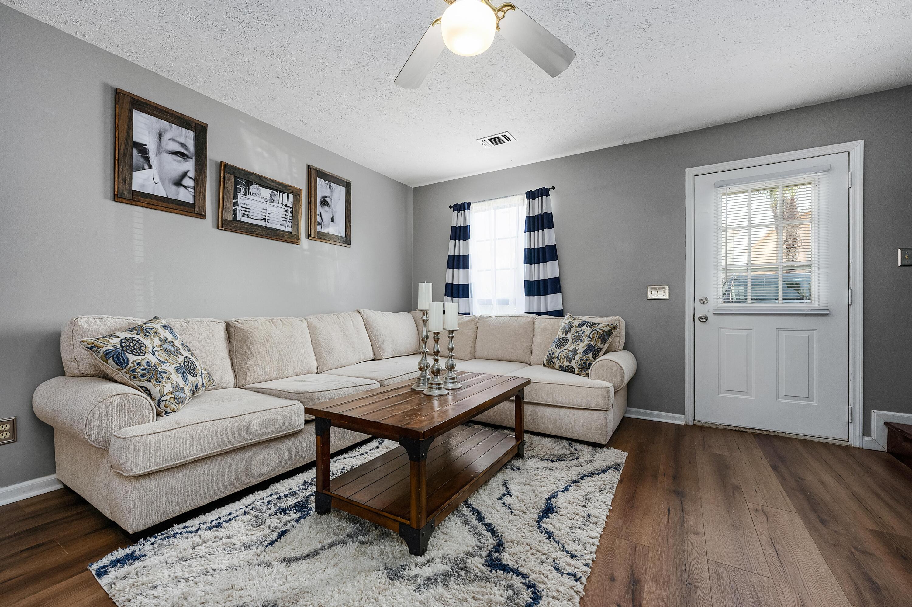 Fantastic condo with lots of great potential and is located on the popular west side of Panama City Beach. This large 2-bedroom 2.5 bath detached unit is ONLY a 5-minute walk to the beautiful white sandy beaches of the Gulf of Mexico. This affordable unit can be used as your permanent residence or make it a money machine with rental projections of up to $43,988. The unit features a large kitchen opened up to the main living area with plenty of space for table and chairs plus extra seating at the kitchen peninsula. Off the kitchen is a private fenced in patio perfect for a hot tub or relaxing in the sun or under your umbrella. A large laundry room and a 1st floor half bath makes this design convenient for families and guests. Upstairs you will find the master bedroom with an attached