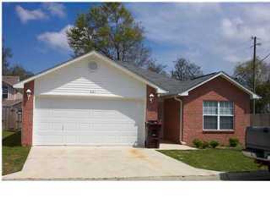 Nice home in small subdivision. Special features in home include french doors to patio, tray ceiling in living room, electric stove, tile floors, Master Suite with a large walk-in closet. Nice angled breakfast bar. Spacious 2 care garage with opener, and pull down stairs.