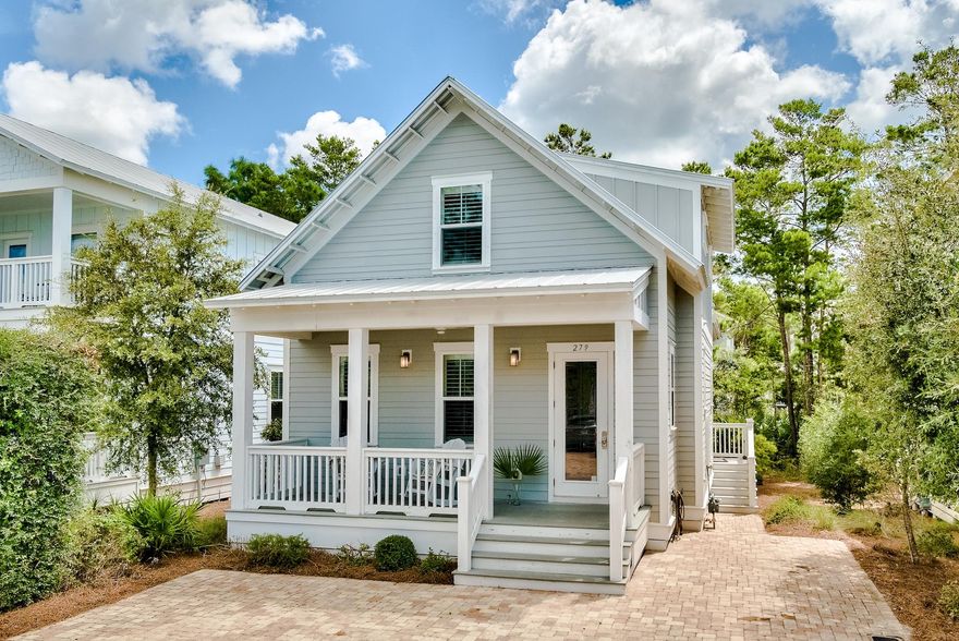 This charming cottage is tucked away in the amenity-rich community of Highland Parks in Blue Mountain Beach. An expansive main living area features tall ceilings, abundance of natural light, and gorgeous furnishings. A well equipped kitchen offers Princeton soft-close cabinetry, a luxury appliance suite, and granite countertops coupled with a beautiful teal glass backsplash. A stunning first-floor master suite is complete with his and her closets and a private en-suite boasting custom tile selections.  The second floor features 2 guest bedrooms each beautifully decorated and generous in size. They share a Jack and Jill style bathroom, but each are complete with a private water closet and vanity. The hallway features an abundance of storage, owners closet and a laundry room. This home has been immaculately maintained by the owners and is offered fully furnished and accessorized. Rental projections show a $70,000 projection making this property a compelling investment given its strong rental history.  The Highland Parks community is highly sought after due to the rich amenities - including a resort styled pool, watch tower with gulf views, a lounge area, and outdoor kitchen. The Beach access is conveniently located at the Blue Mountain Regional access - a quick bike or golf car ride away. A cost to own, finish and feature list and rental projections are available upon request- please inquire today.