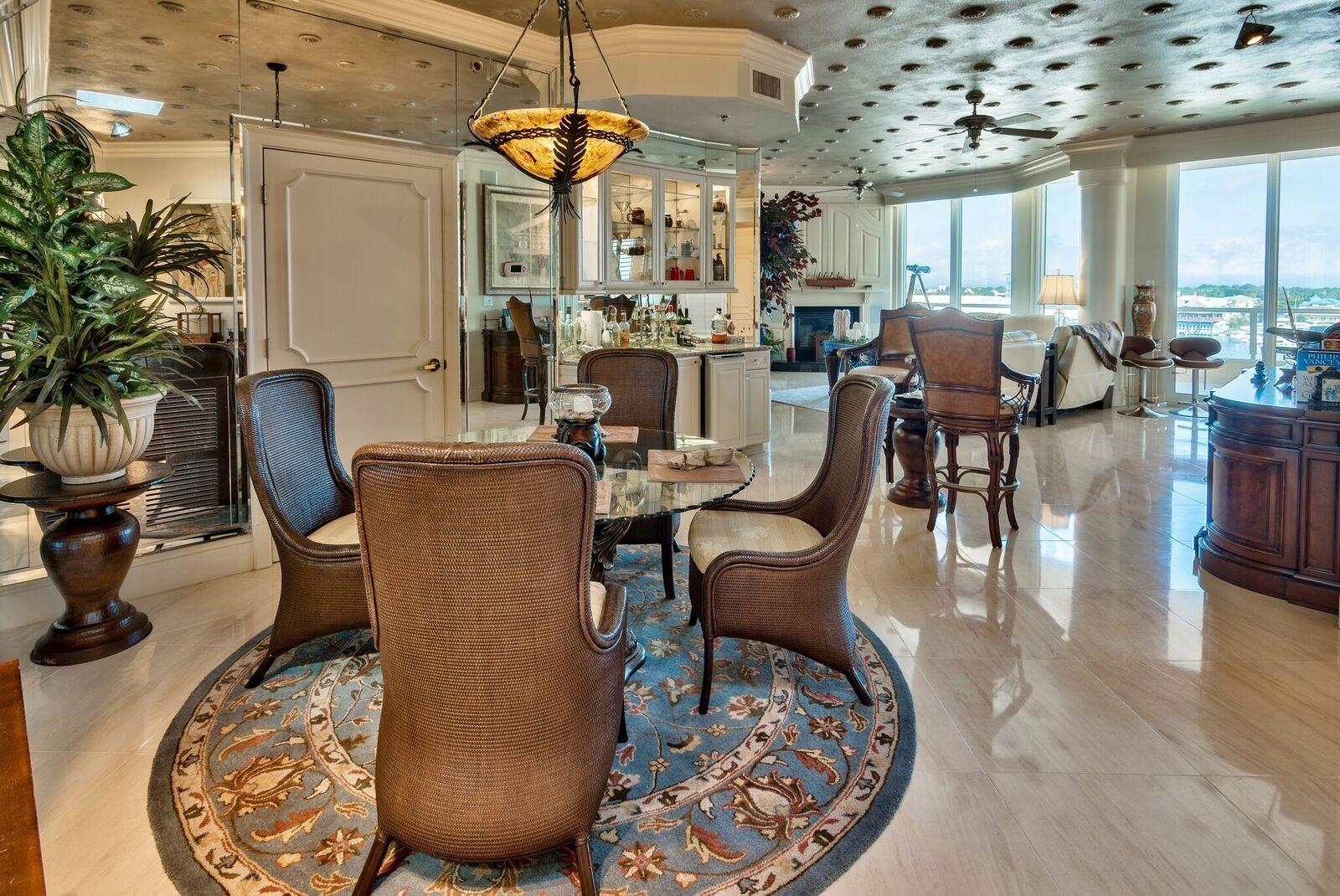 Penthouse level condo in a Non-rental building. Here is your opportunity to live on the beach in a residence that offers the space and privacy of a home on the water, with the convenience, security, and maintenance free lifestyle of a luxury condo. Custom features through out including Limestone floors & Platinum ceilings with handmade medallions. 2 Fireplaces to enjoy including 1 in your Master Bedroom. 2 large balconies with amazing views of the Harbor. Amenities include, fitness center, community room, Pool, hot tub, beach access, & more.